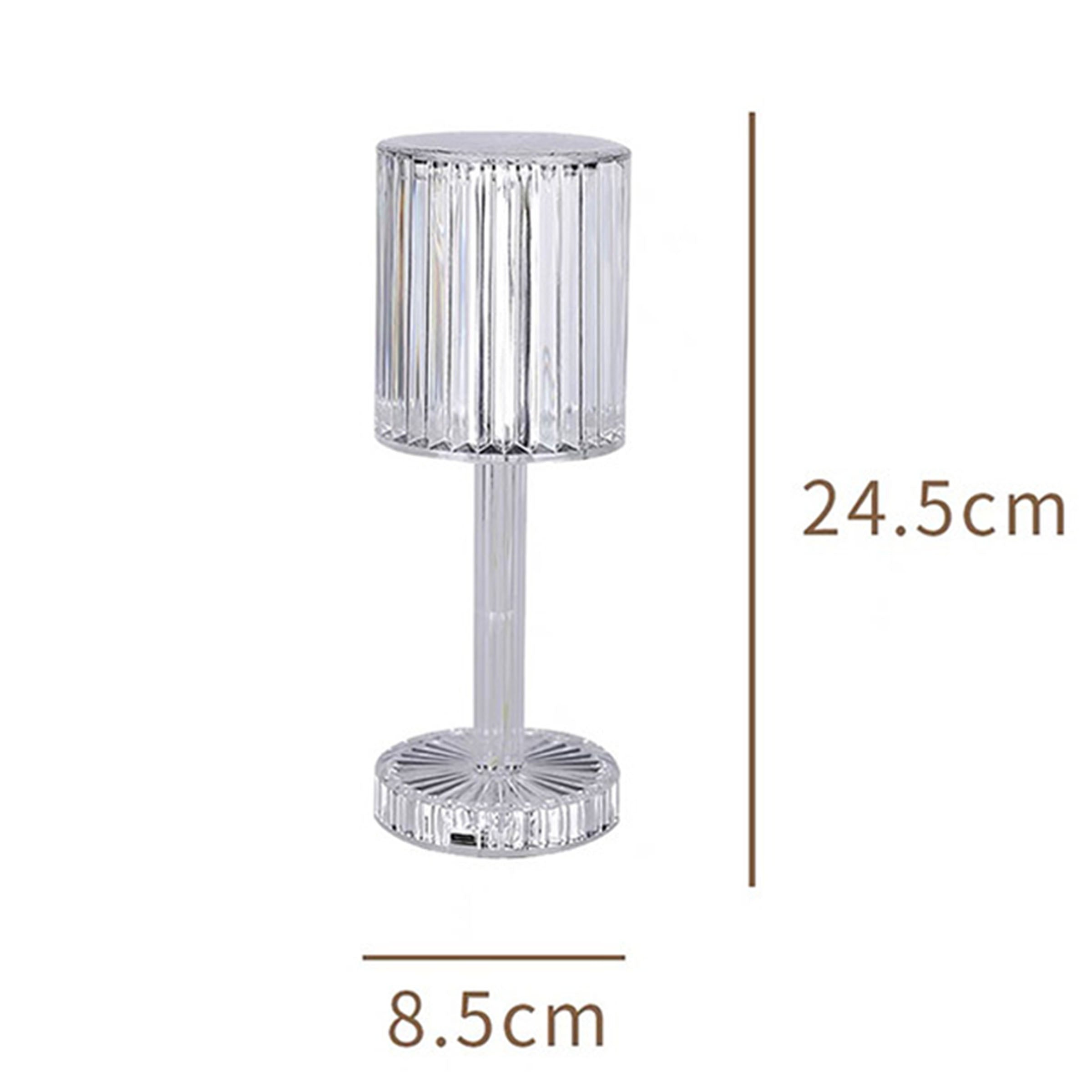 BEACON transparent night light table lamp on a desk, modern design with soft illumination for ambient lighting.