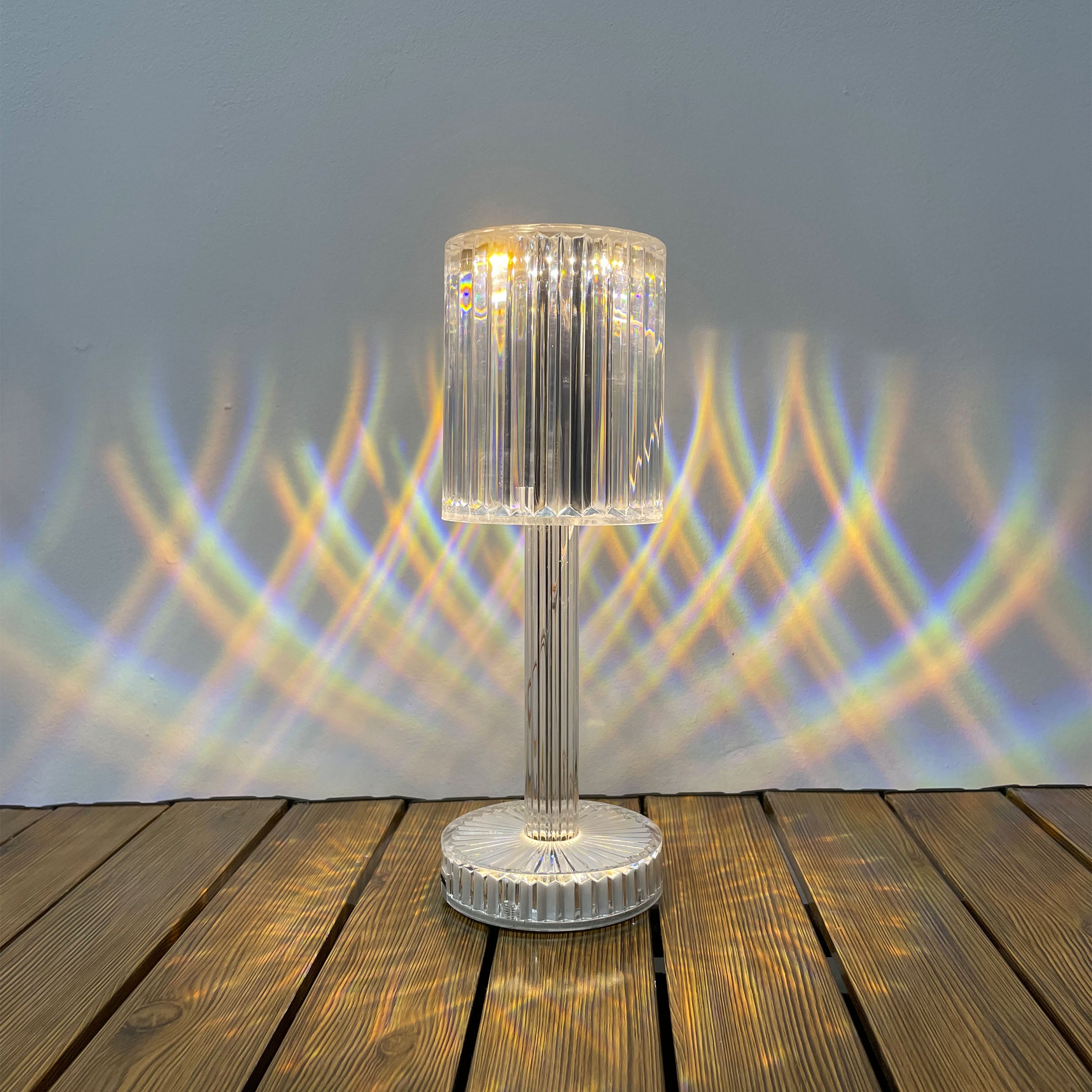 Transparent BEACON night light table lamp on a desk, soft glow, modern design, ideal for ambient lighting and decoration.
