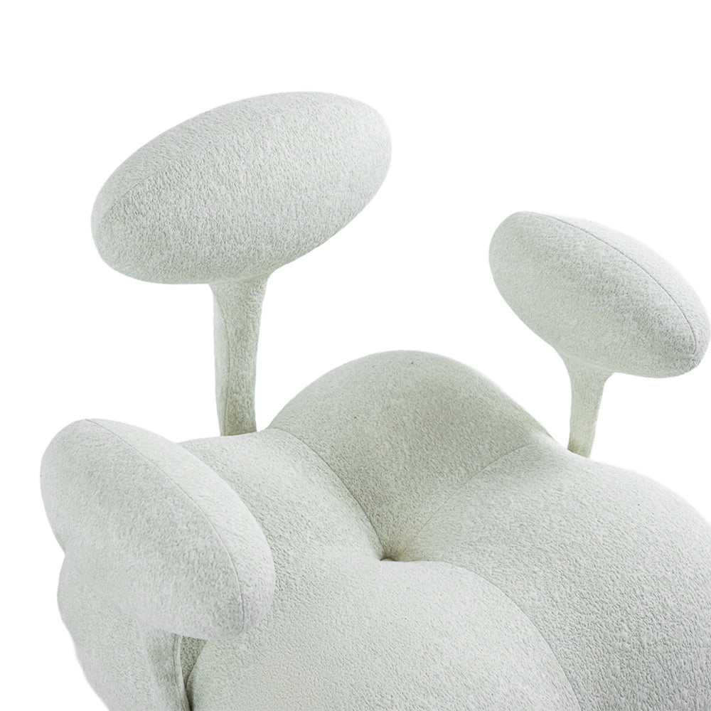 Beige and white Nodus lounge chair by BEACON, featuring modern design and cushioned seating for comfortable relaxation.