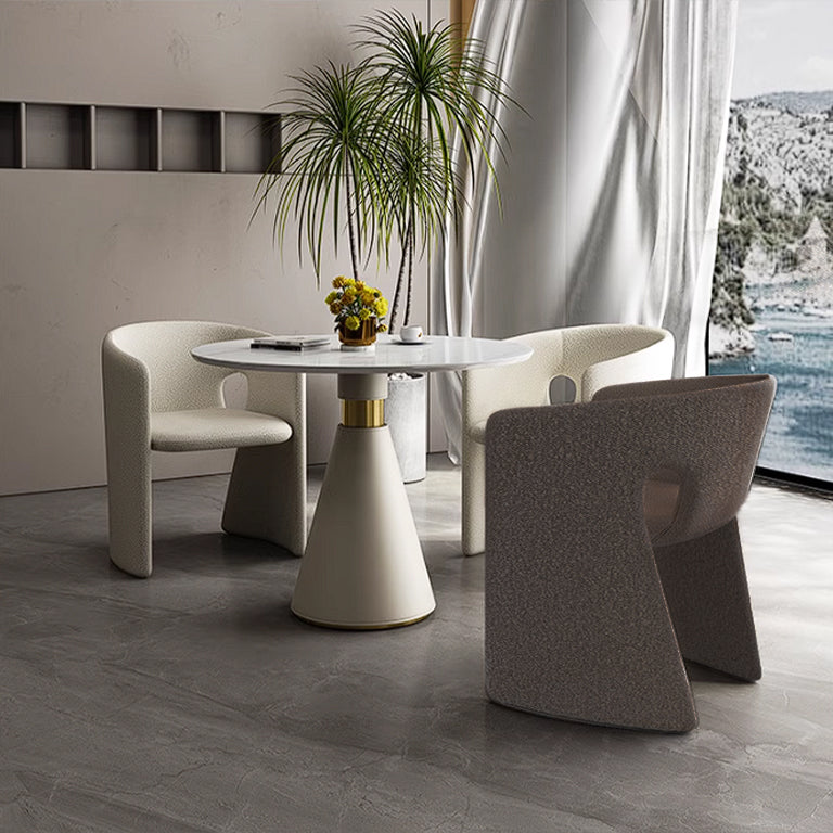 Beige Obsidian dining chair by BEACON with sleek modern design, upholstered seat and wooden legs.