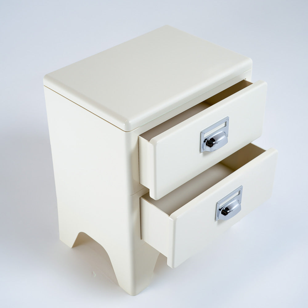 Off White ABS side table by RUDI, modern bedside table with sleek design and sturdy construction for bedroom or living space.