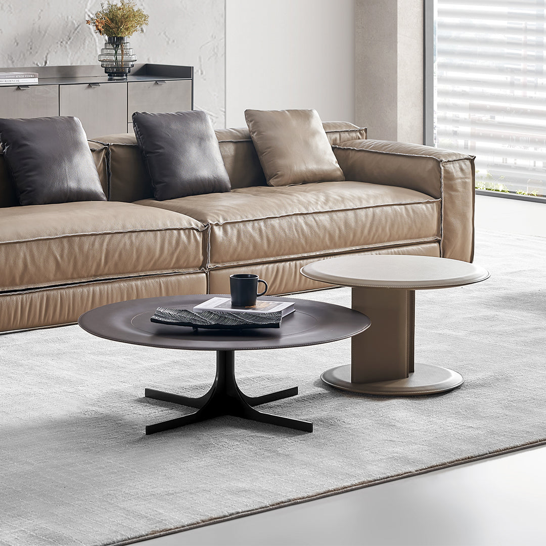 BEACON Orbit Lux Brown Saddle Leather Coffee Table with sleek design and smooth leather surface.