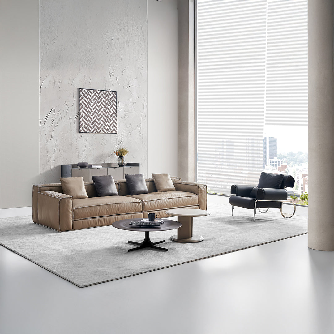 BEACON Orbit Lux brown saddle leather coffee table with sleek design and sturdy legs, ideal for modern living rooms.
