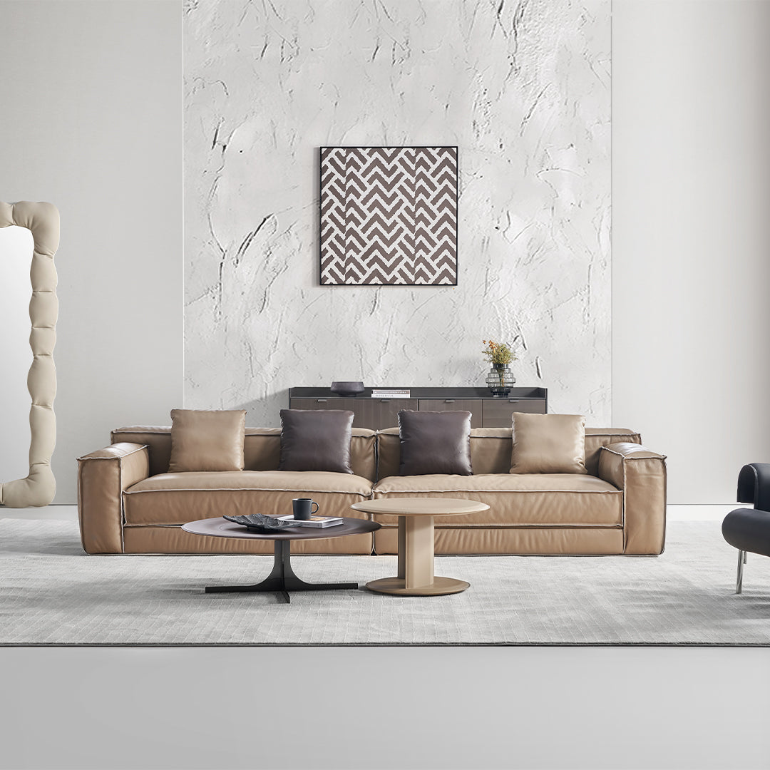 BEACON Orbit Lux brown saddle leather coffee table with sleek design and sturdy legs, perfect for modern living room decor.