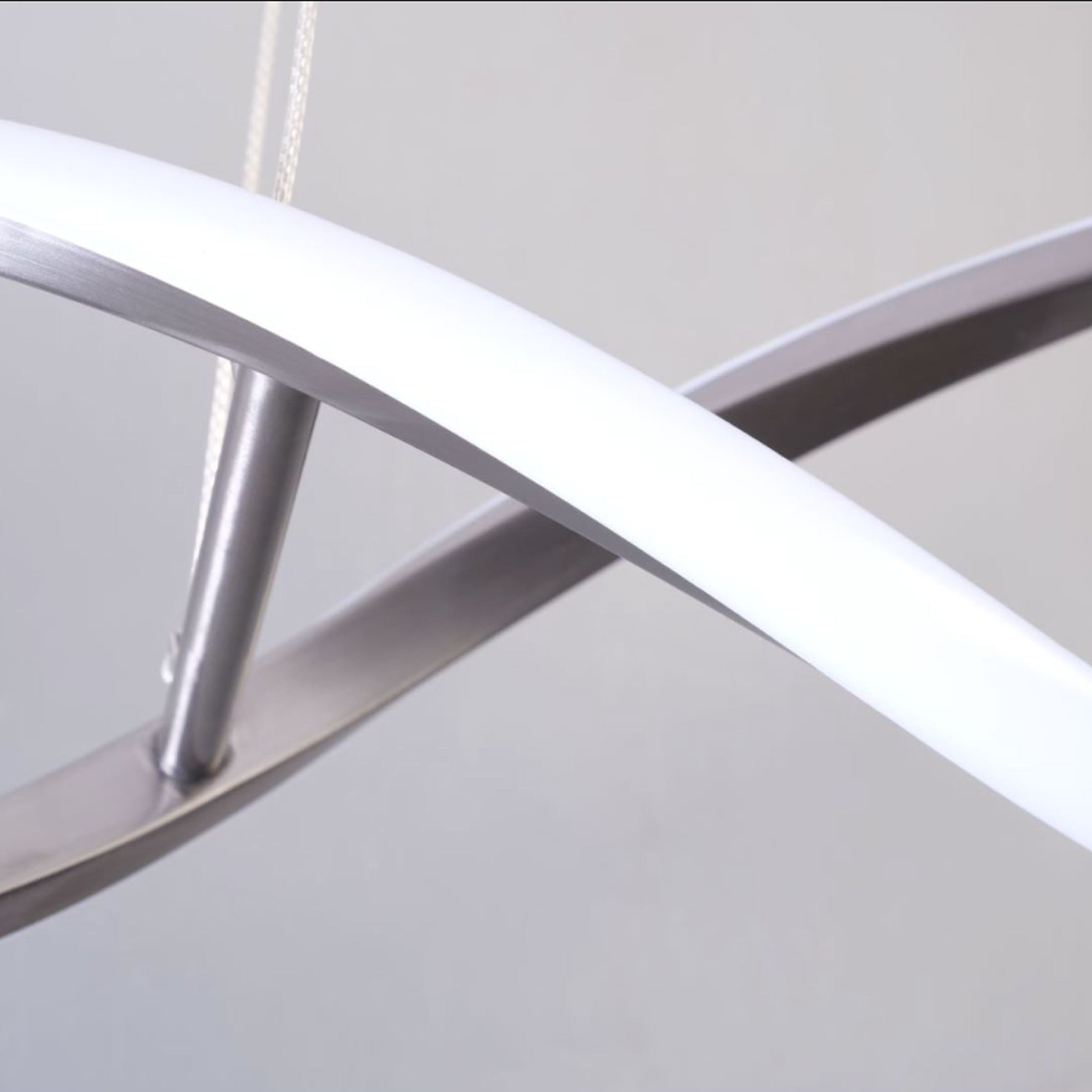 BEACON Orbital Symphony Steel Pendant Lamp, modern pendant light with sleek steel design, perfect for contemporary interiors.