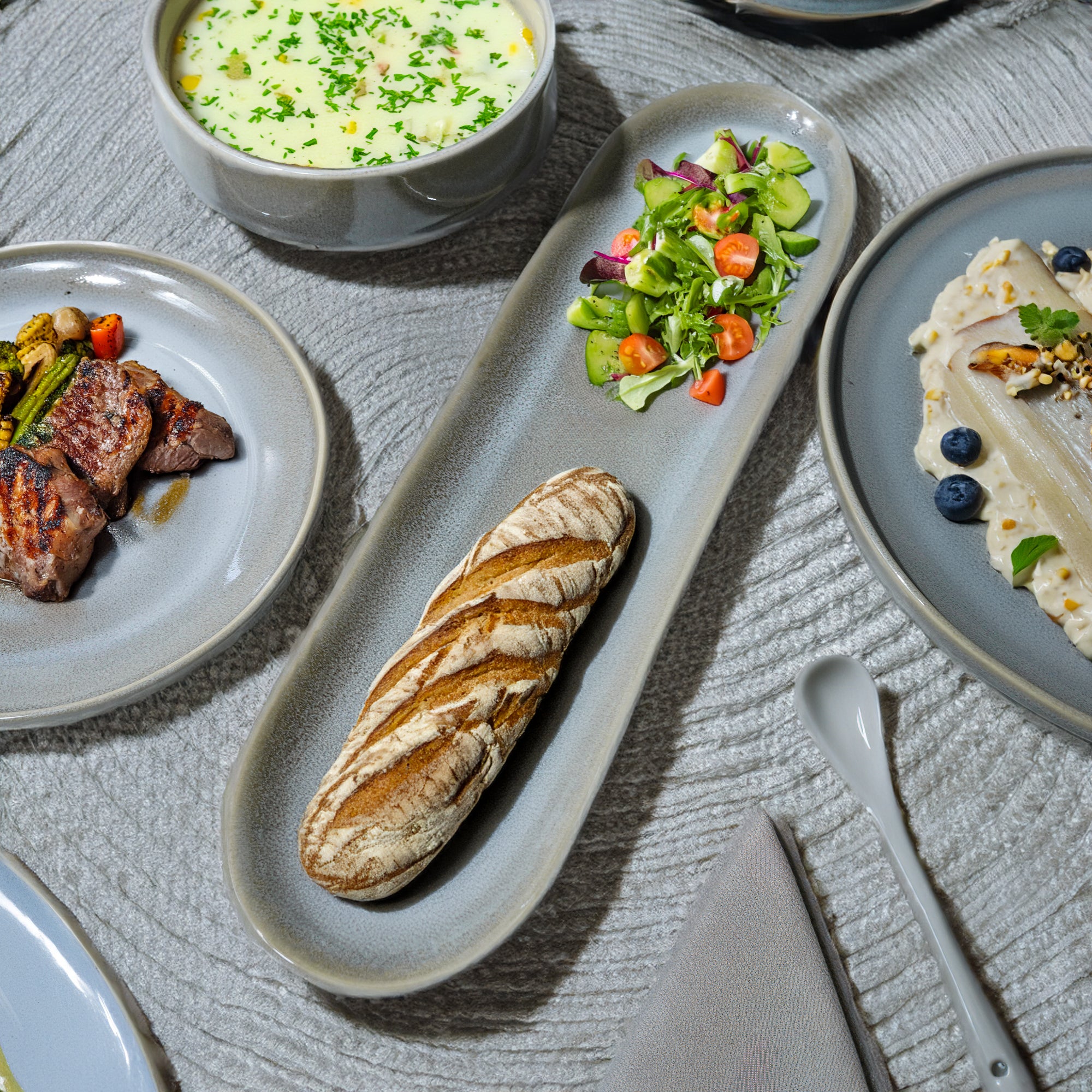 Gray Passifoy long tray by BEACON, model HZ2827, made of durable material, ideal for serving or display purposes.