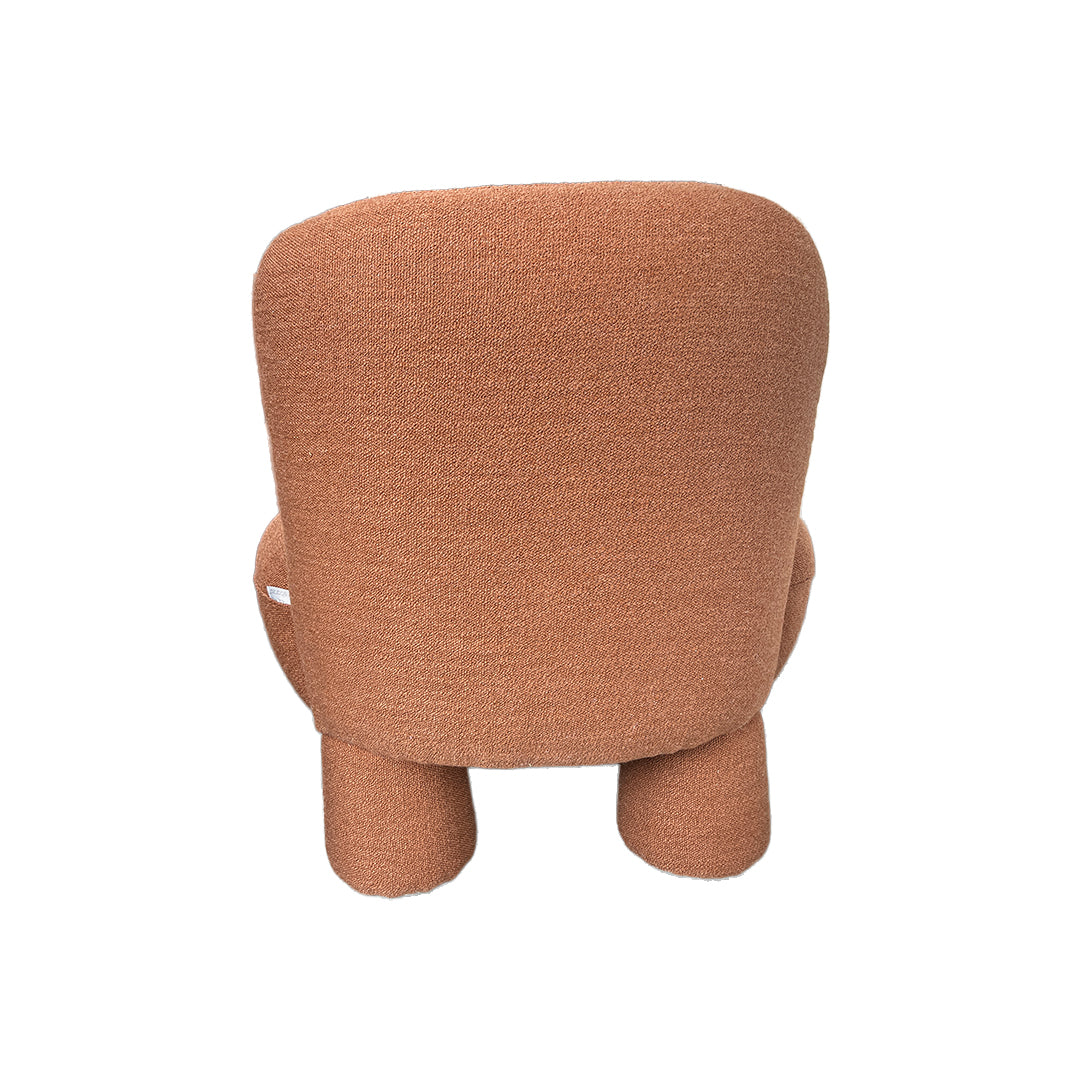 BEACON Pebble Lounge Chair MZ7639 with rounded pebble-shaped backrest and cushioned seat in a modern lounge setting.