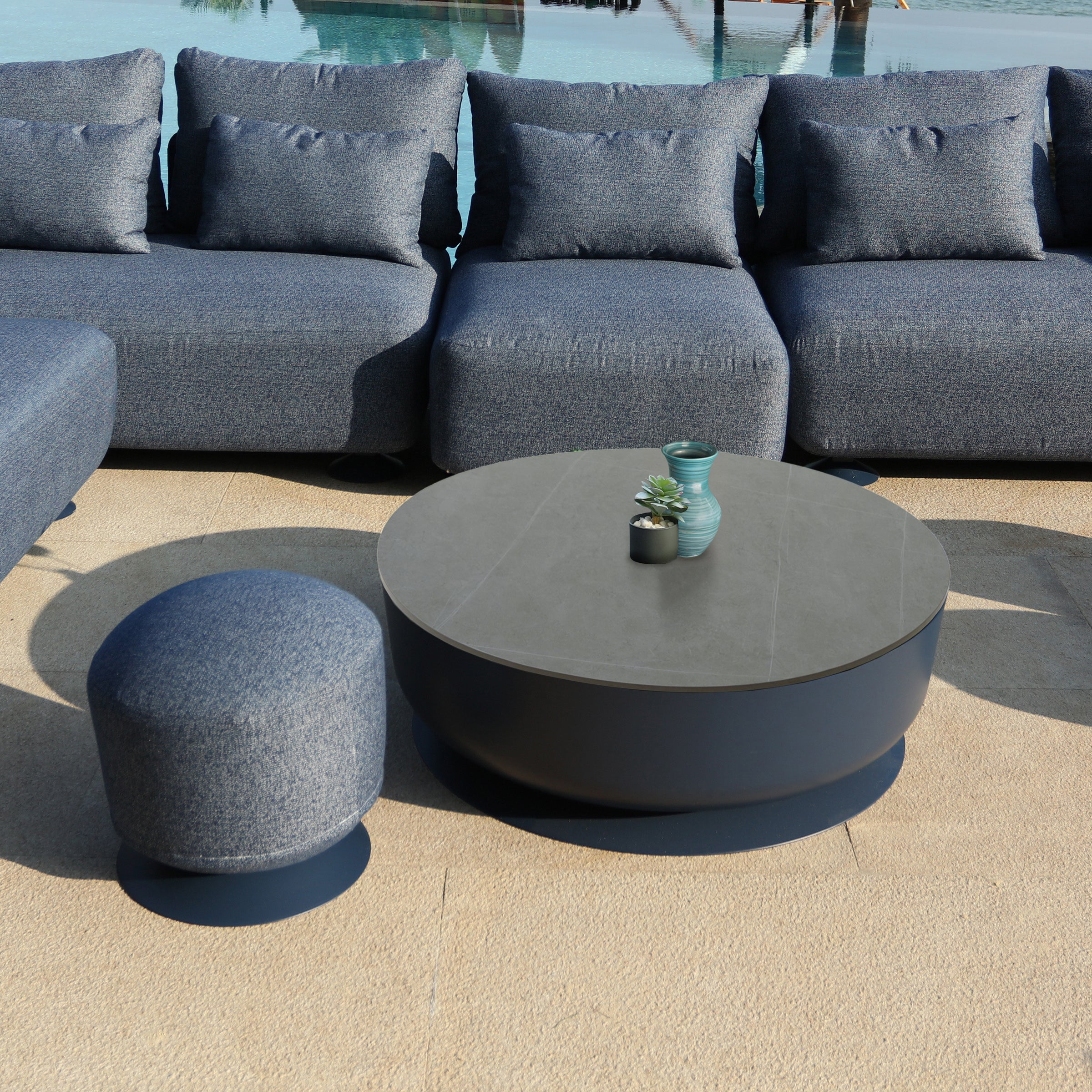 Penguin-shaped outdoor coffee table by BEACON, made of durable material, featuring a playful penguin design for outdoor patio use.