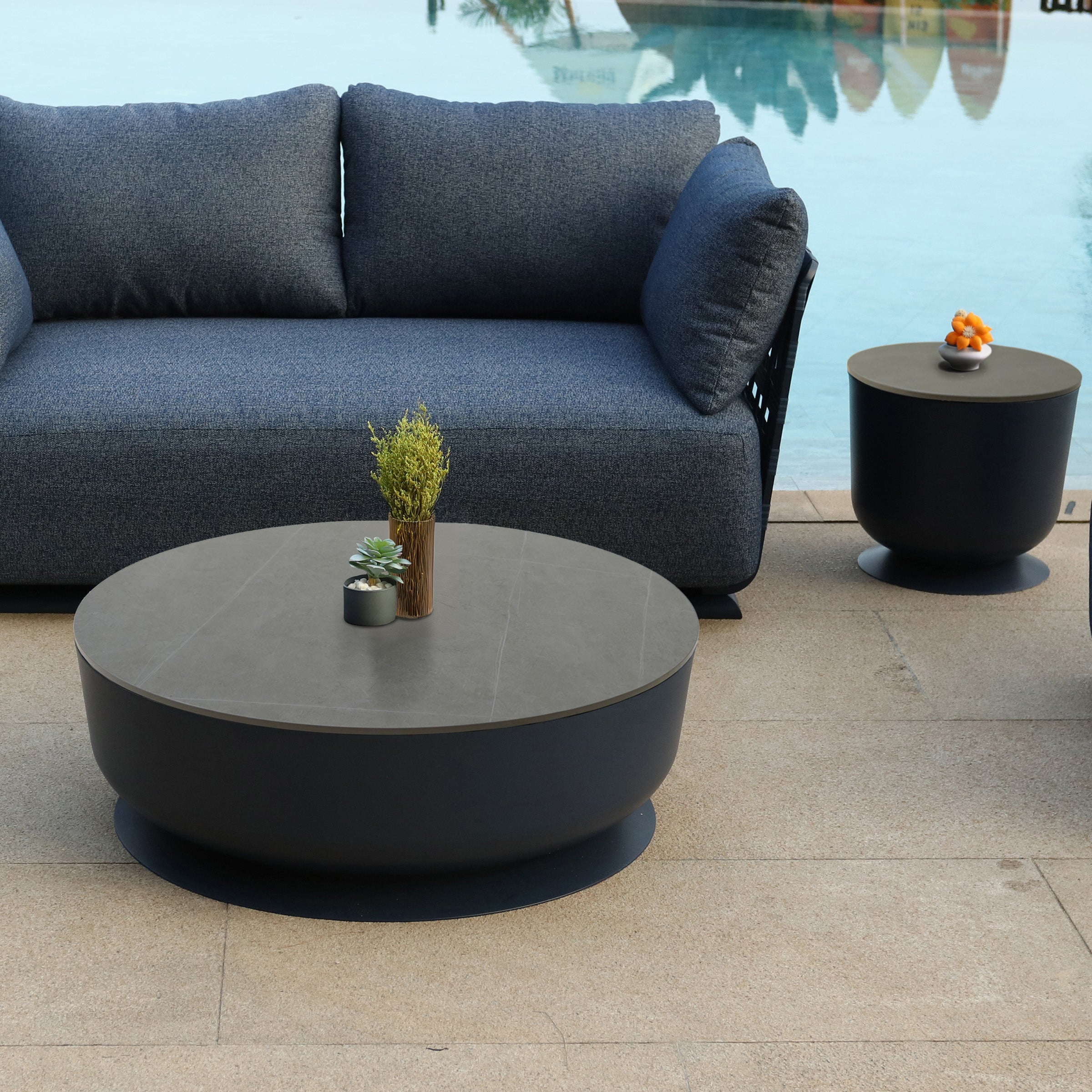 Outdoor Penguin Side Table by BEACON, durable outdoor table with penguin design, ideal for patio or garden use.