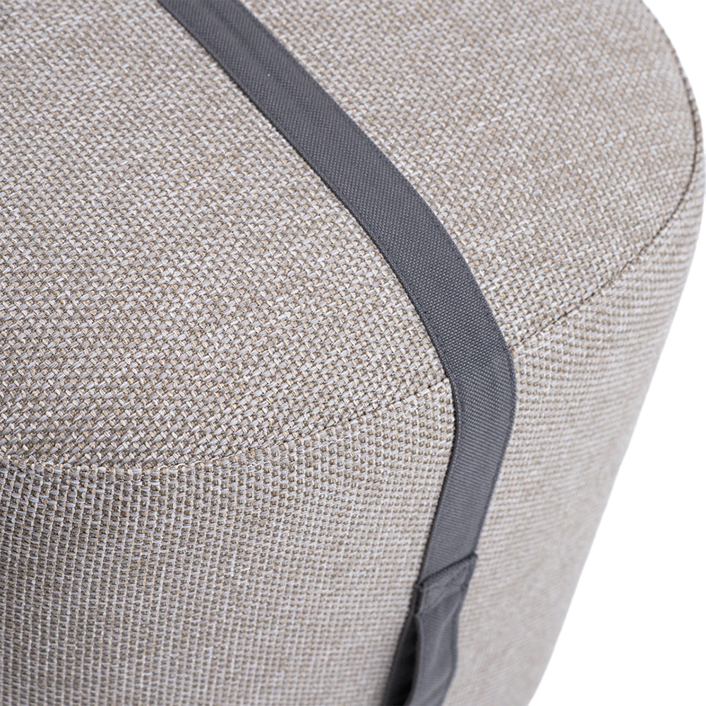 Small BEACON Ribbon Stool Pouf with colorful fabric covering and cylindrical shape, perfect for casual seating or decor.