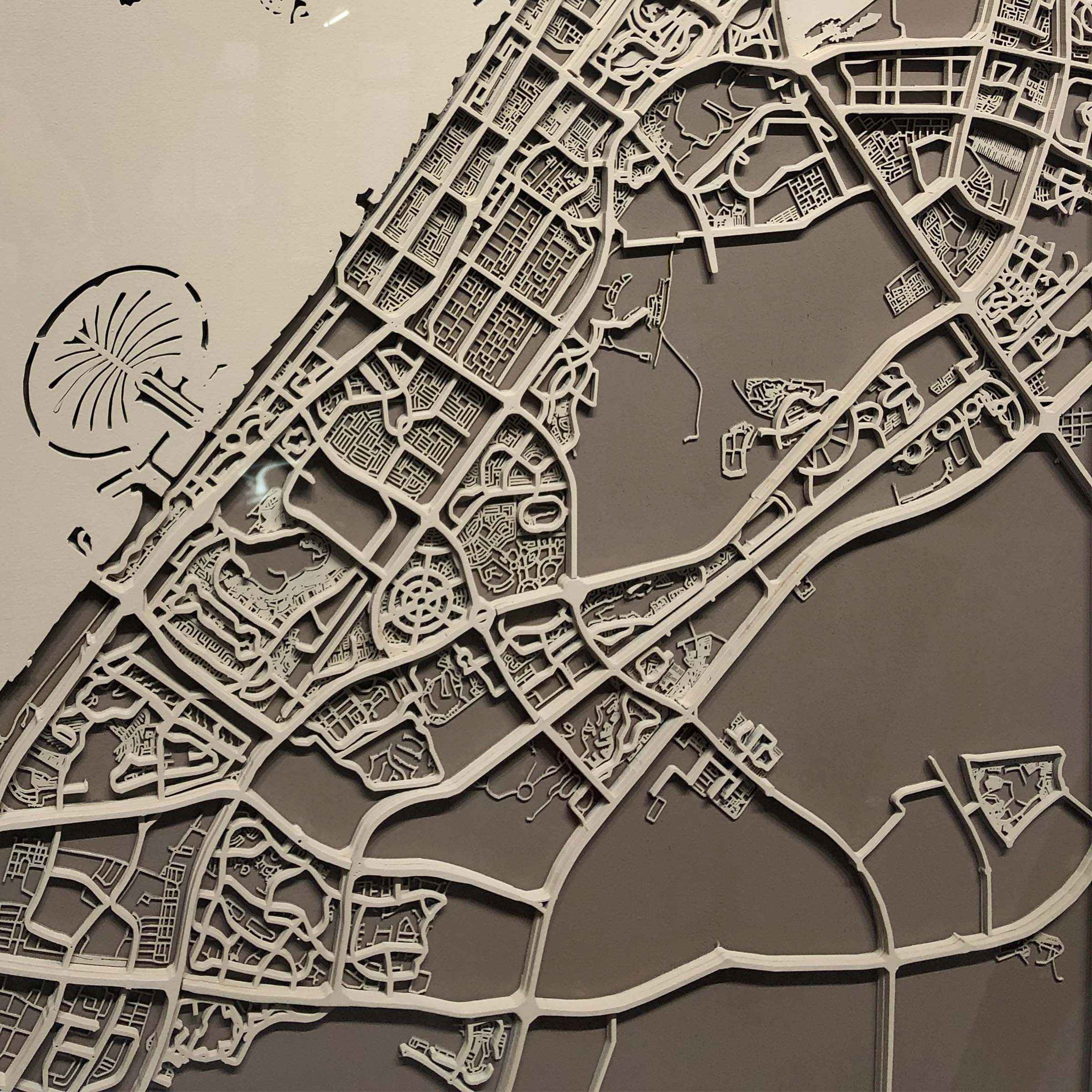 Handmade Dubai map painting by BEACON, 120x120 cm, detailed cityscape art on canvas for home or office decor.