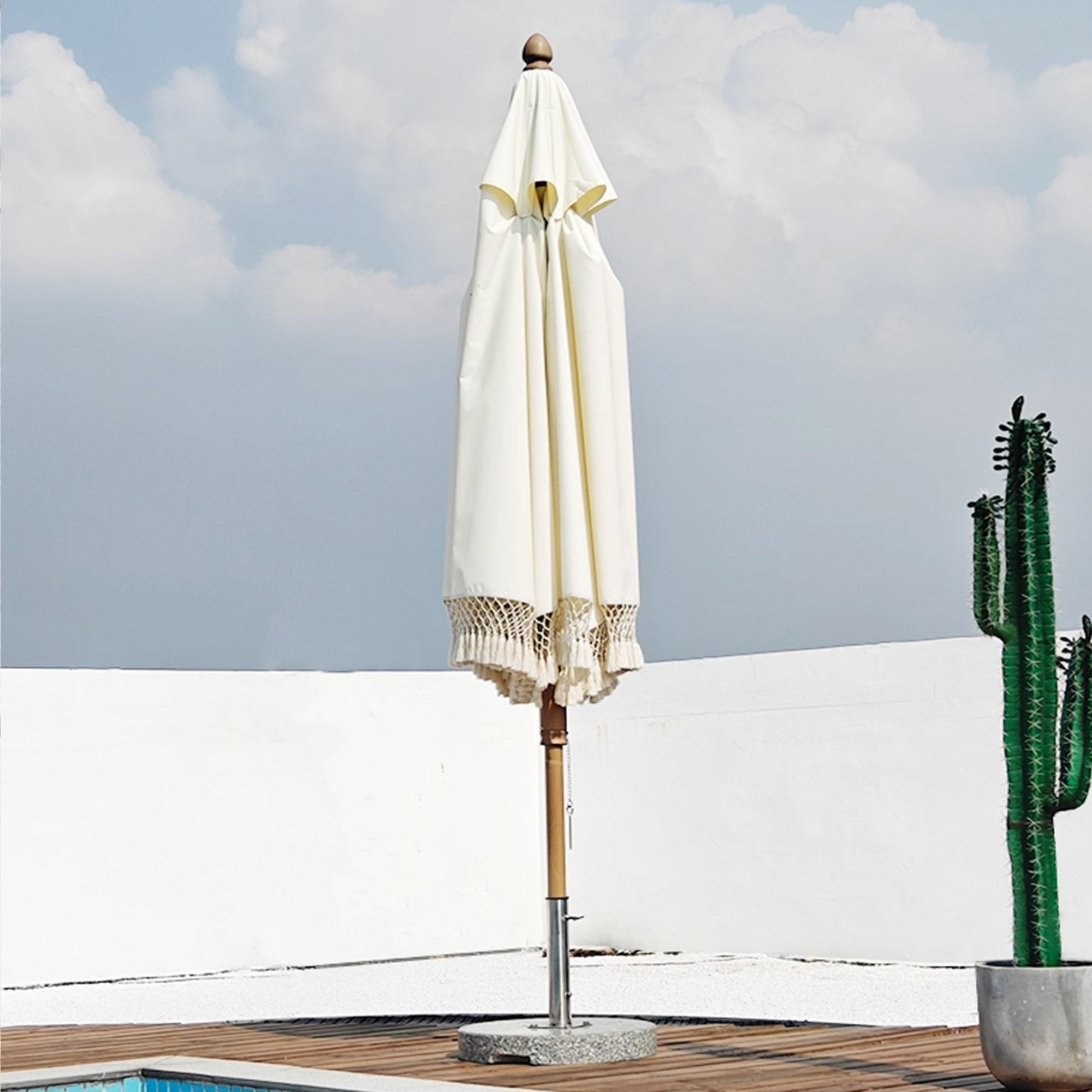 BEACON outdoor center pole umbrella with push-up and down system, gray fabric, sturdy metal pole for patio shading.