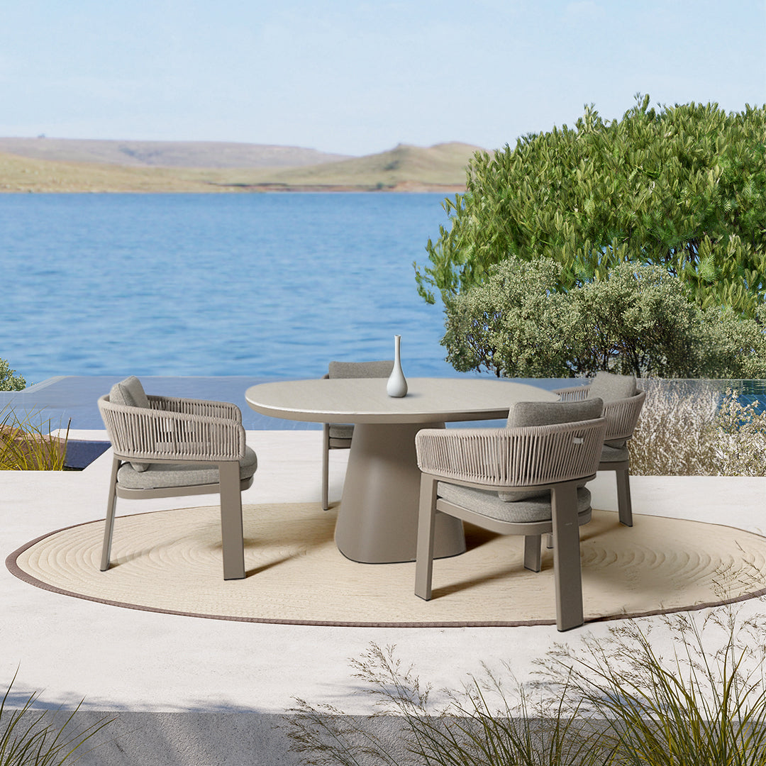 Cayenne outdoor dining armchair by BEACON, made of durable materials, shown with a modern design ideal for outdoor seating.