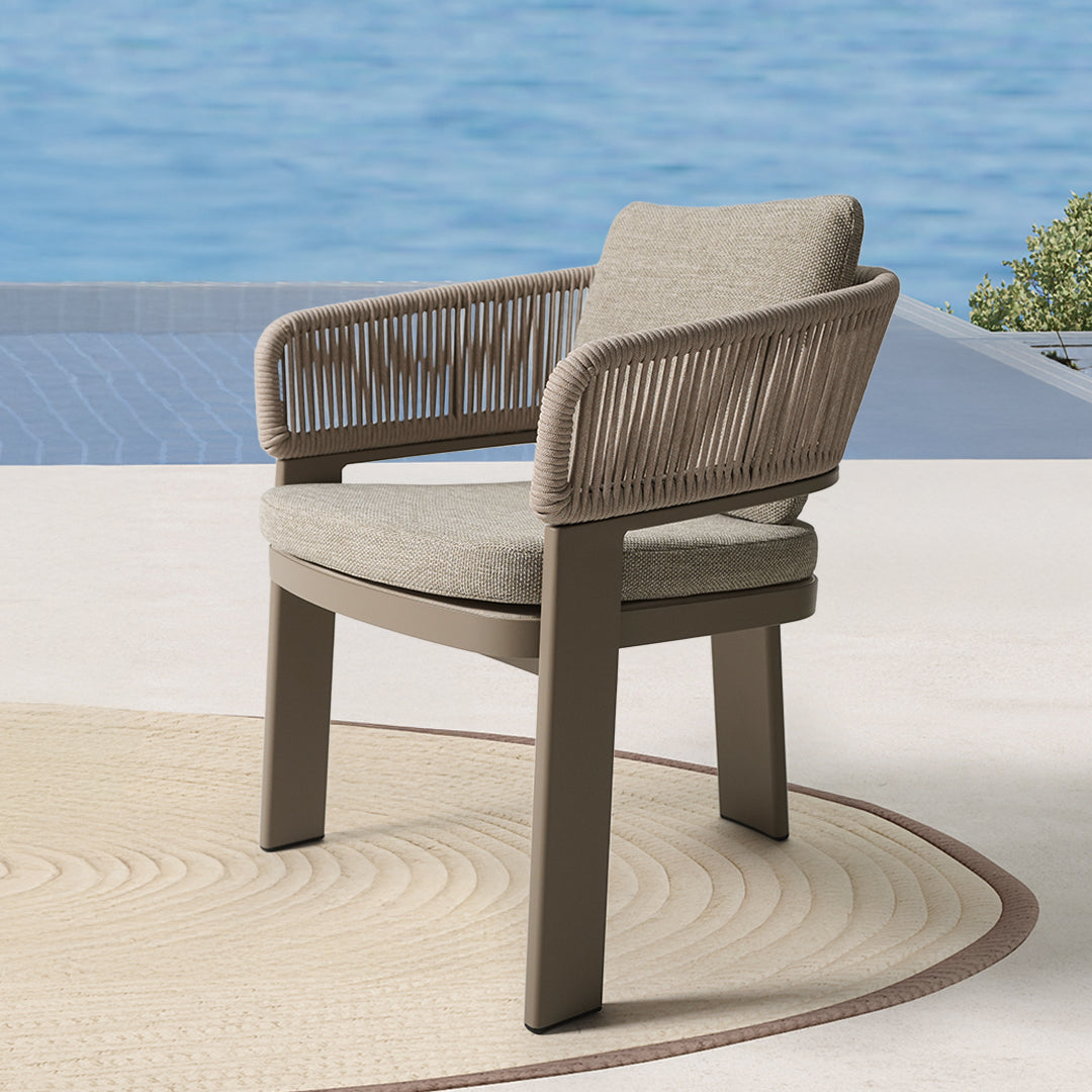 Outdoor Cayenne dining armchair by BEACON, featuring a sleek design and durable frame, ideal for outdoor patio seating.