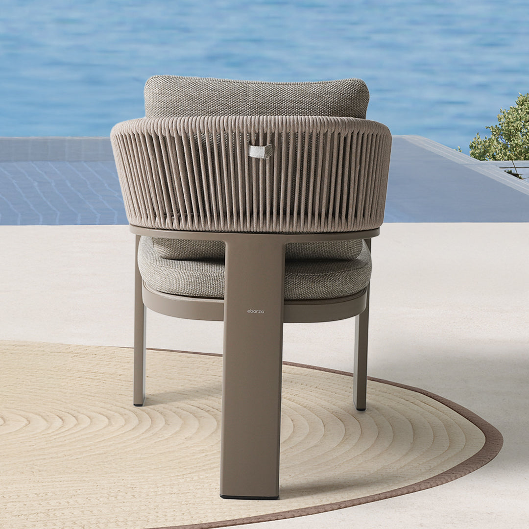BEACON Cayenne outdoor dining armchair in black, with armrests and woven design, suitable for garden or patio use.