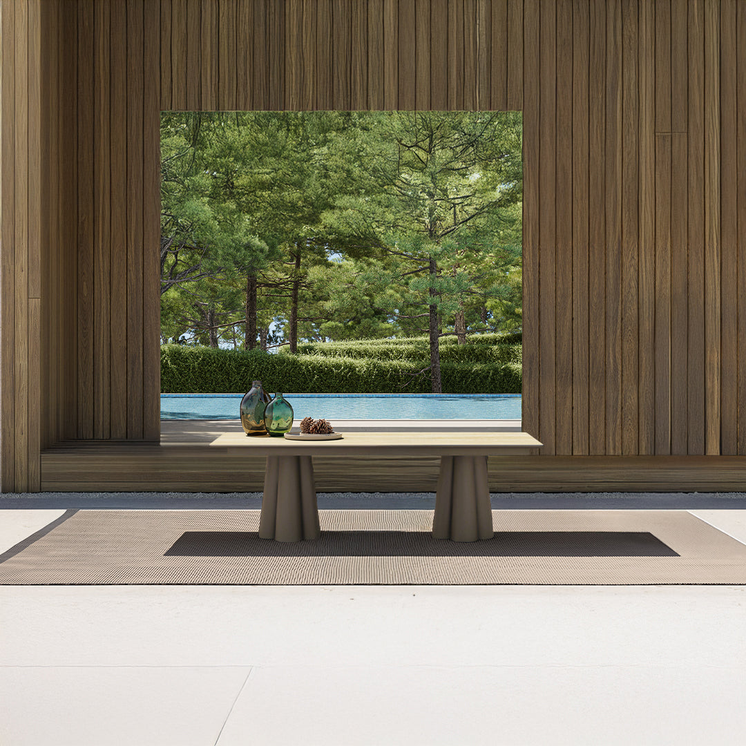 Outdoor extendable dining table by BEACON with 2 extensions, made of durable material, perfect for outdoor dining and gatherings.