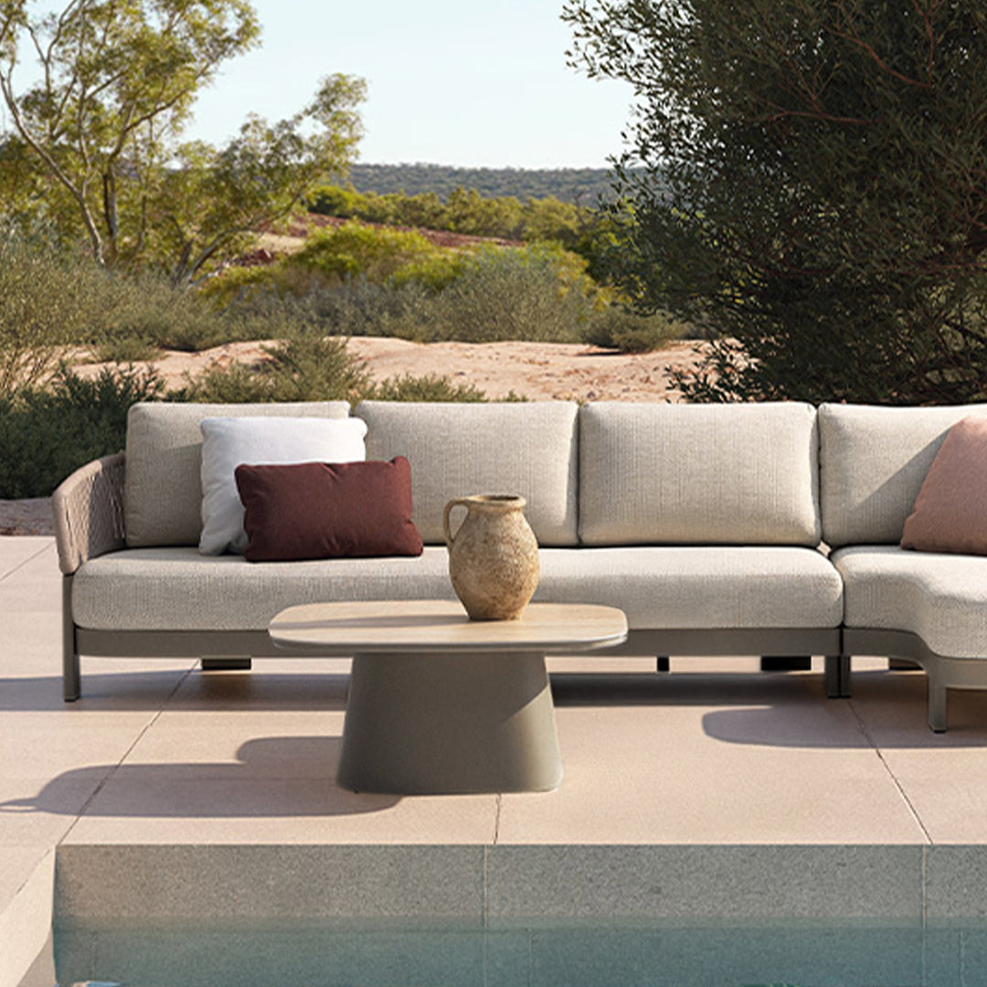 Outdoor coffee table with ceramic top from BEACON ALMADG, designed for outdoor use, shown with a sleek ceramic surface.