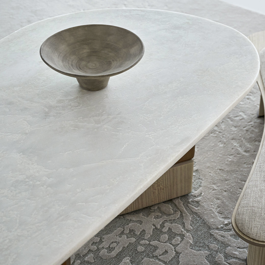 Grandeur marble and veneer dining table by BEACON, modern dining table with sleek surface and sturdy legs.