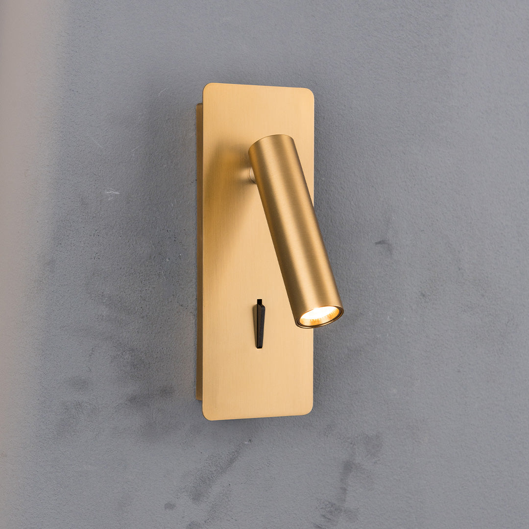 BEACON Gemini Hotel Style Wall Reading Lamp mounted on headboard, featuring a modern design with adjustable arm and warm lighting.