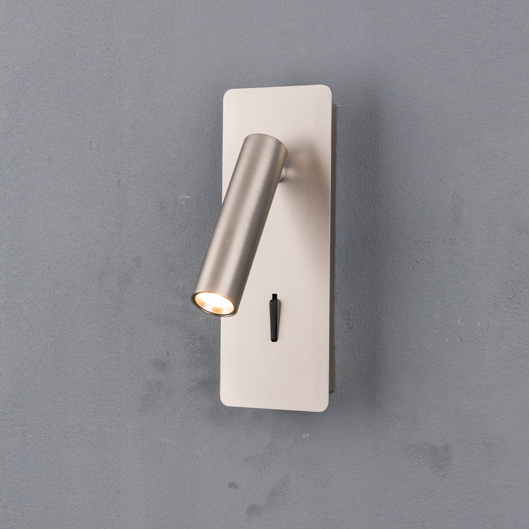 Gemini Hotel Style Wall Reading Lamp by BEACON, wall-mounted fixture with sleek design and adjustable arm for bedside lighting.