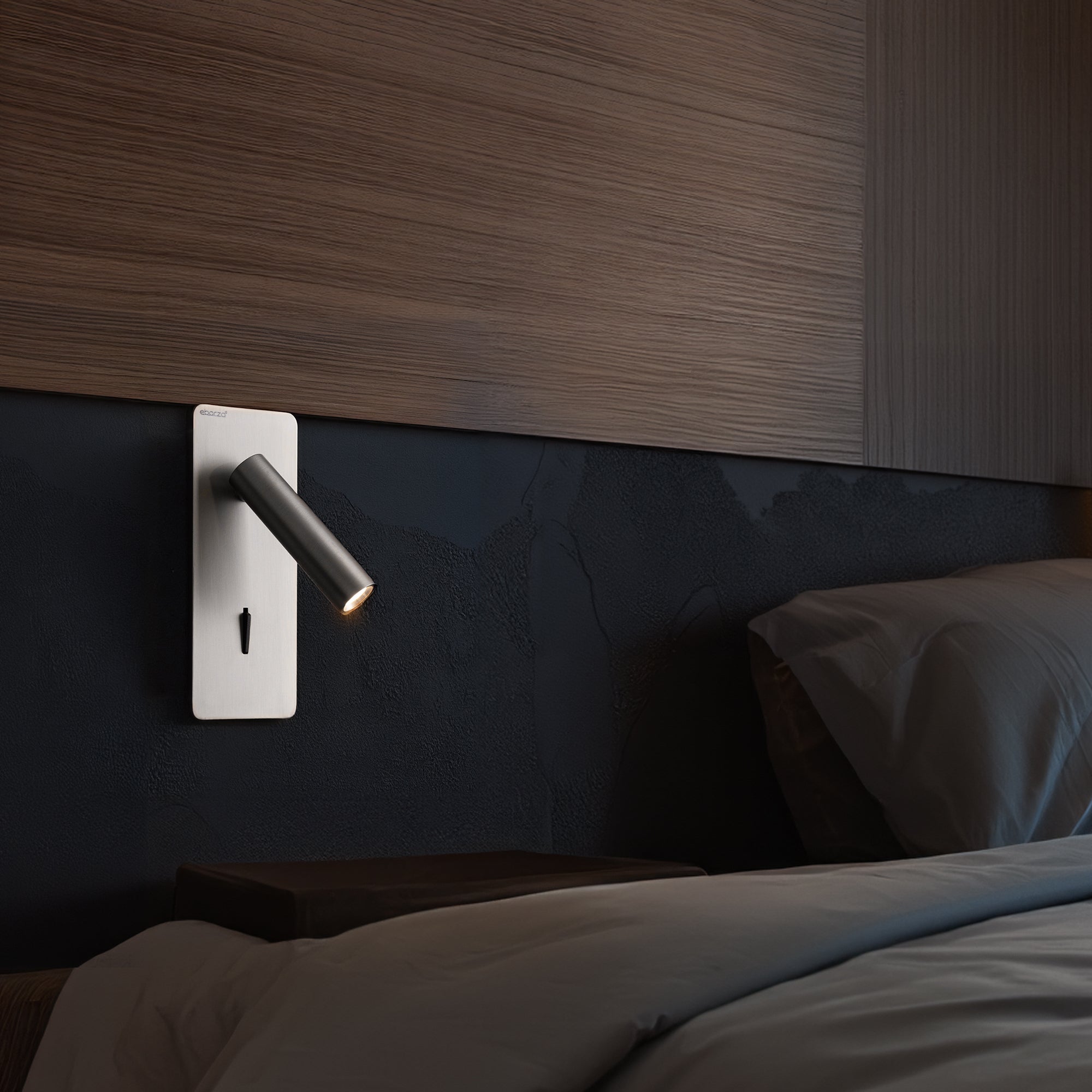 BEACON Gemini hotel-style wall reading lamp mounted on headboard, featuring sleek design and adjustable lighting.