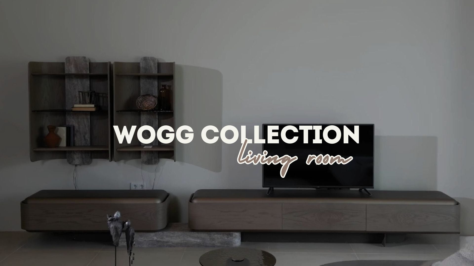 Wogg living room collections 2026
Its sleek lines and high-quality materials from grey marble to natural woods, make it the perfect centerpiece for your living room, offering a stylish solution for your entertainment needs.
            

مجموعة غرفة المعيشة Wogg 2026
بخطوط أنيقة ومواد فاخرة من الرخام الرمادي إلى الخشب الطبيعي، صُممت هذه المجموعة لتكون القطعة المحورية في غرفة المعيشة، حيث تجمع بين الأسلوب العصري والحل العملي لاحتياجات الترفيه في منزلك.