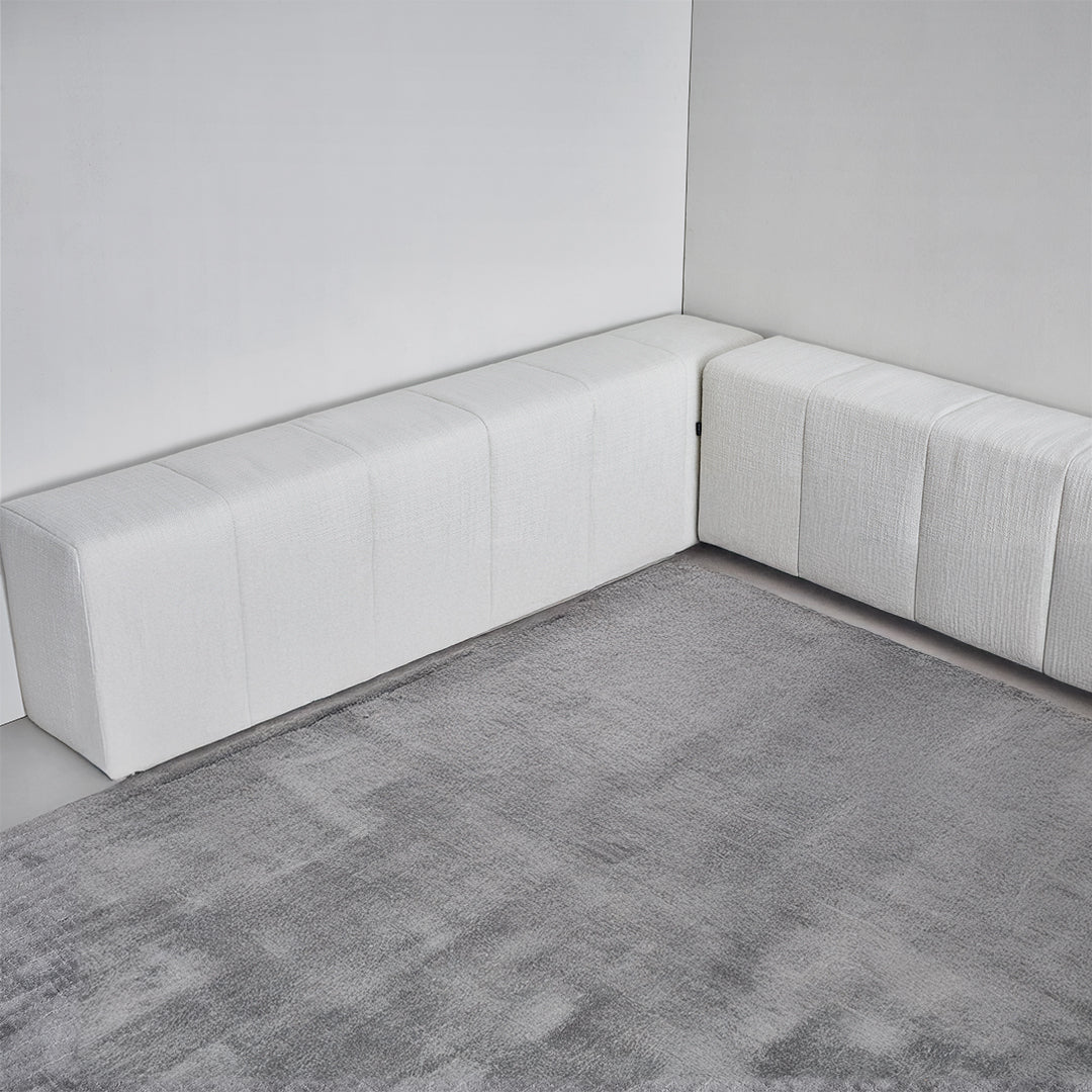 BEACON Puzzle Headboard and Long Back Sofa Unit, modern bedstead with integrated seating and storage, in a sleek design.