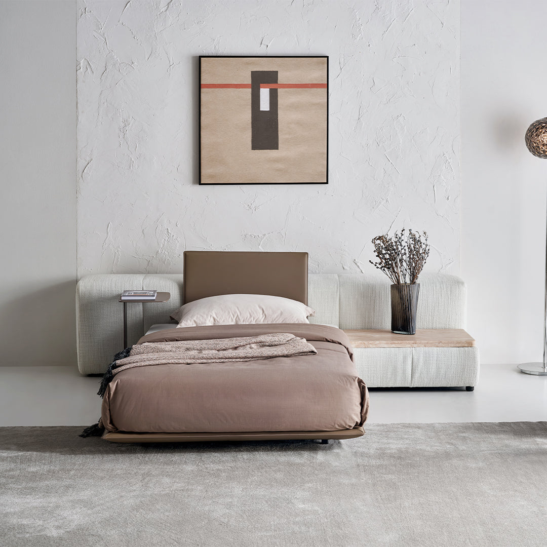 BEACON Puzzle Headboard and Long Back Sofa Unit in a modern bedstead design, featuring a stylish and functional furniture piece.