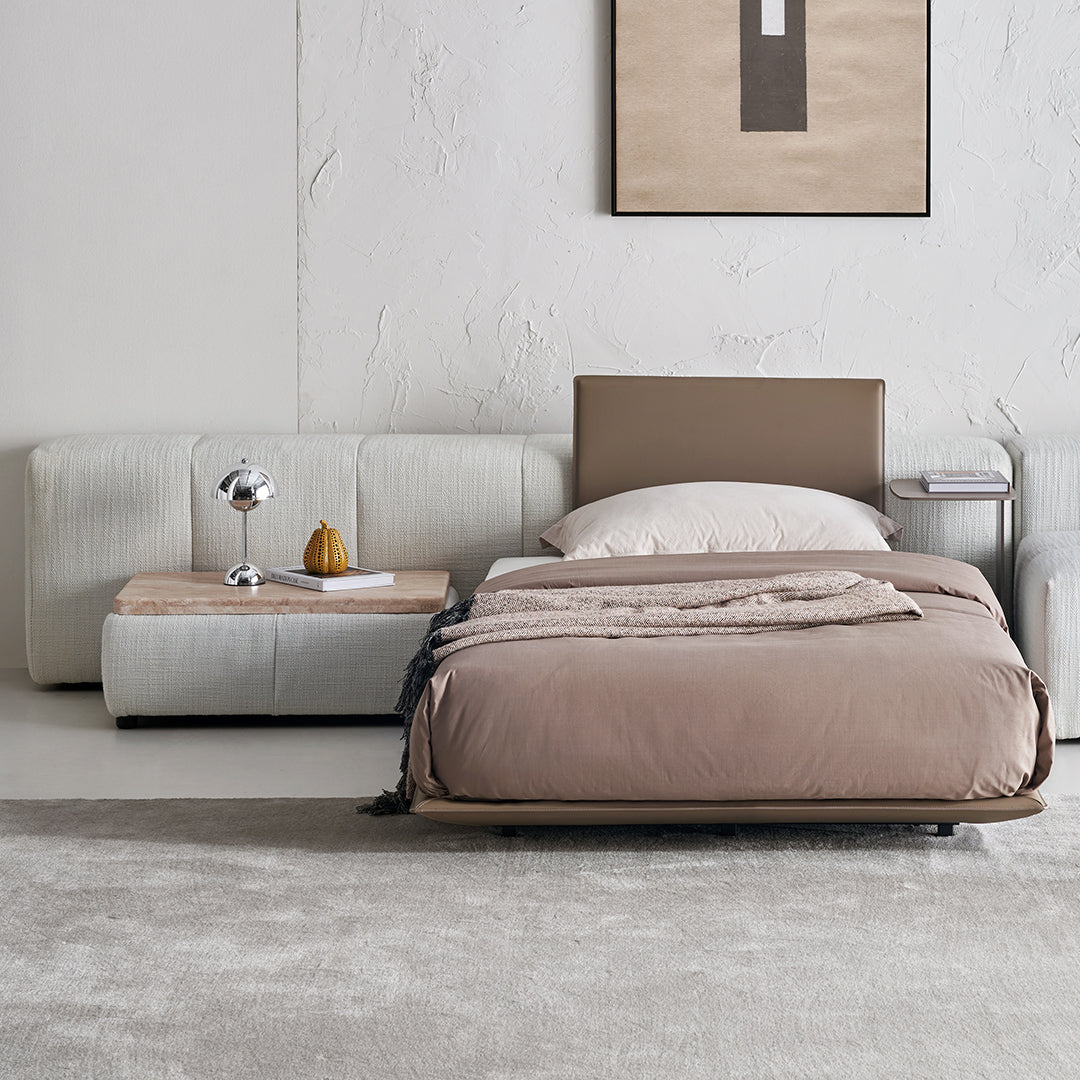 BEACON puzzle headboard and long back sofa unit, modern bedstead with integrated seating, in a sleek design.