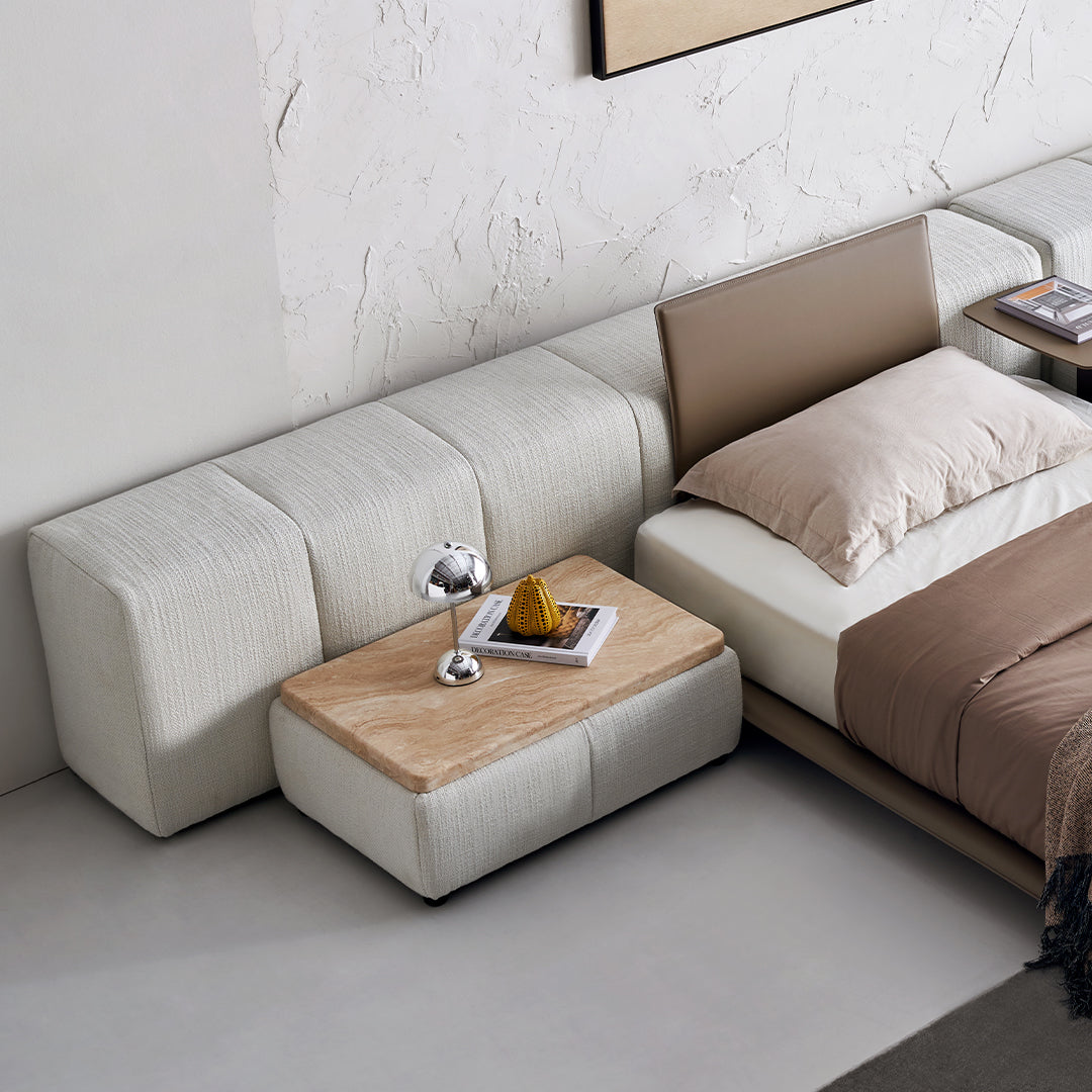 Puzzle headboard and long back sofa unit from BEACON Bedsteads, featuring a modern, modular design in a natural wood finish.