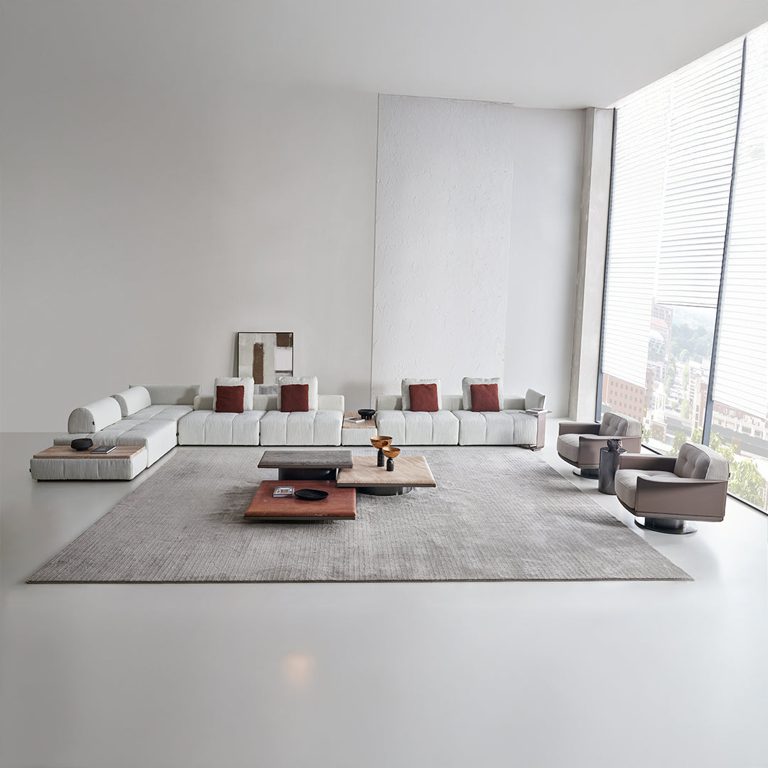 Modular fabric sofa with metal handrail in a puzzle design, featuring long sections and contemporary style by BEACON.