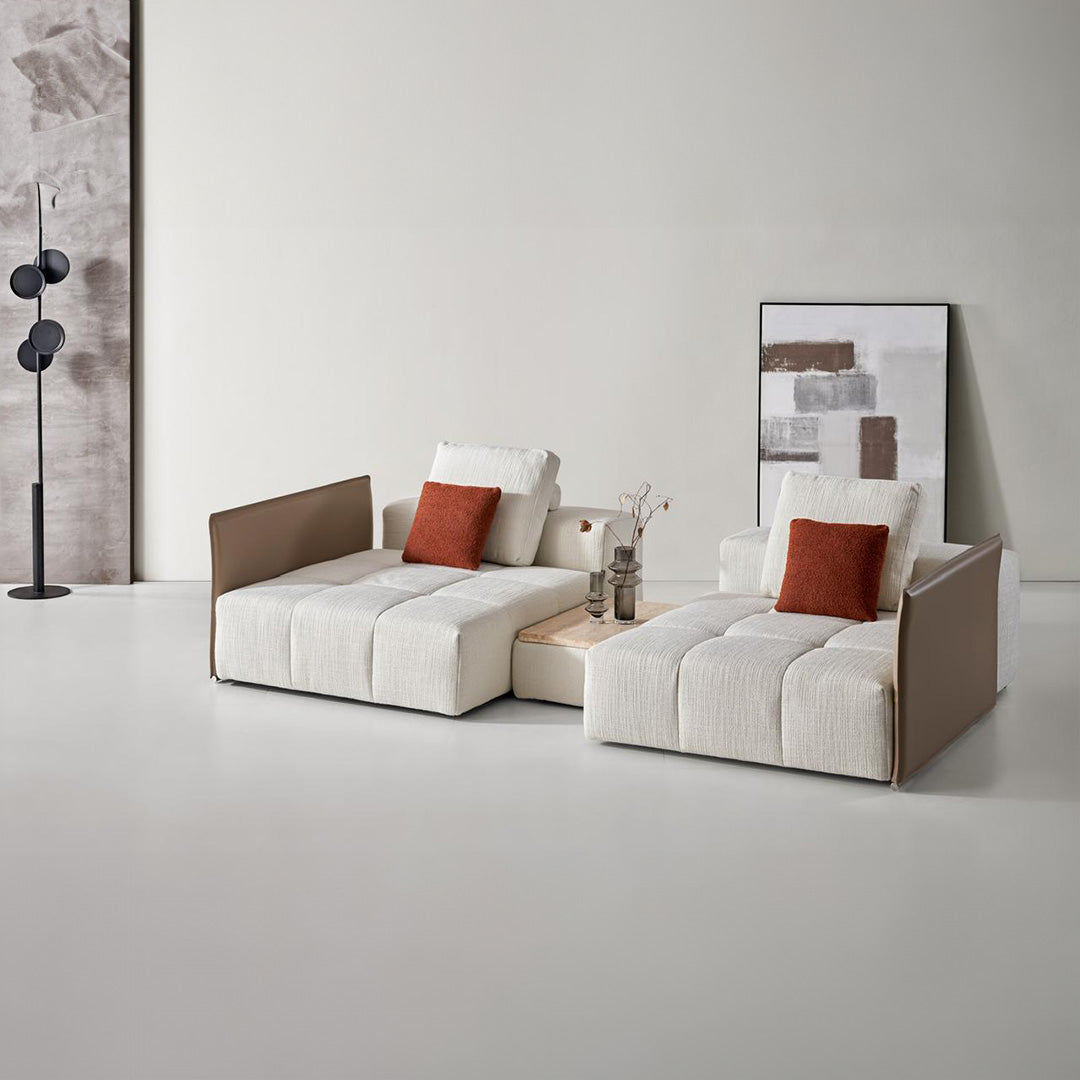 BEACON modular sofa with saddle leather upholstery and short metal handrail, featuring a puzzle design in a modern living room setting.