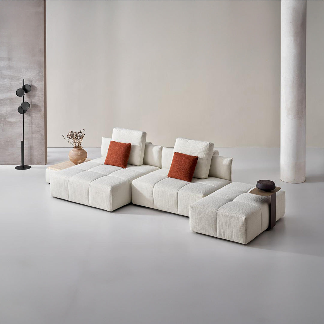 Bronze Puzzle Modular Side Table for sofas by BEACON, featuring a geometric, interlocking design perfect for contemporary living spaces.