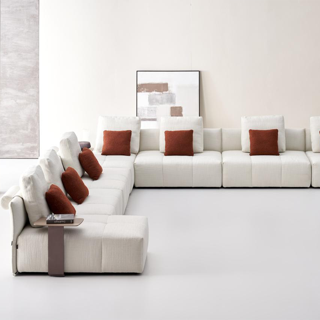 Small BEACON Puzzle Modular 2-seater sofa with contemporary design, featuring soft fabric cushions and customizable sections.