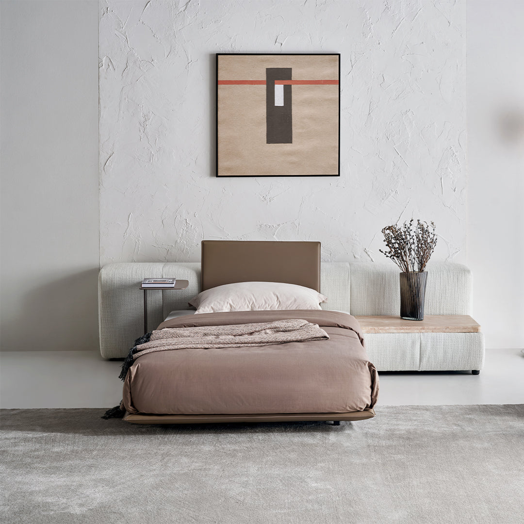 Puzzle Suspended Single Bed Base with Backrest by BEACON, showcasing the sleek bedstead with a modern design and integrated backrest.