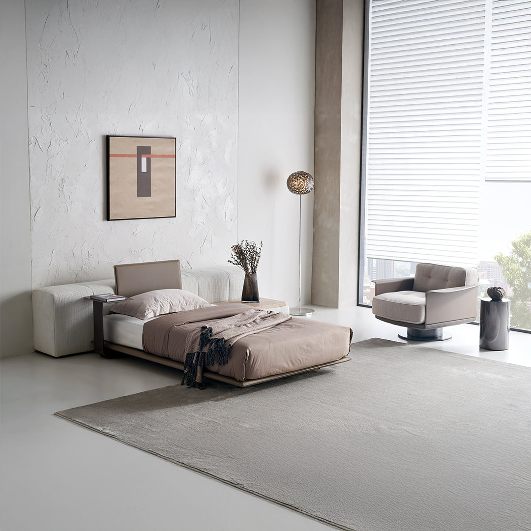 Suspended single bed base with one backrest by BEACON, featuring a puzzle design and modern bedstead style.