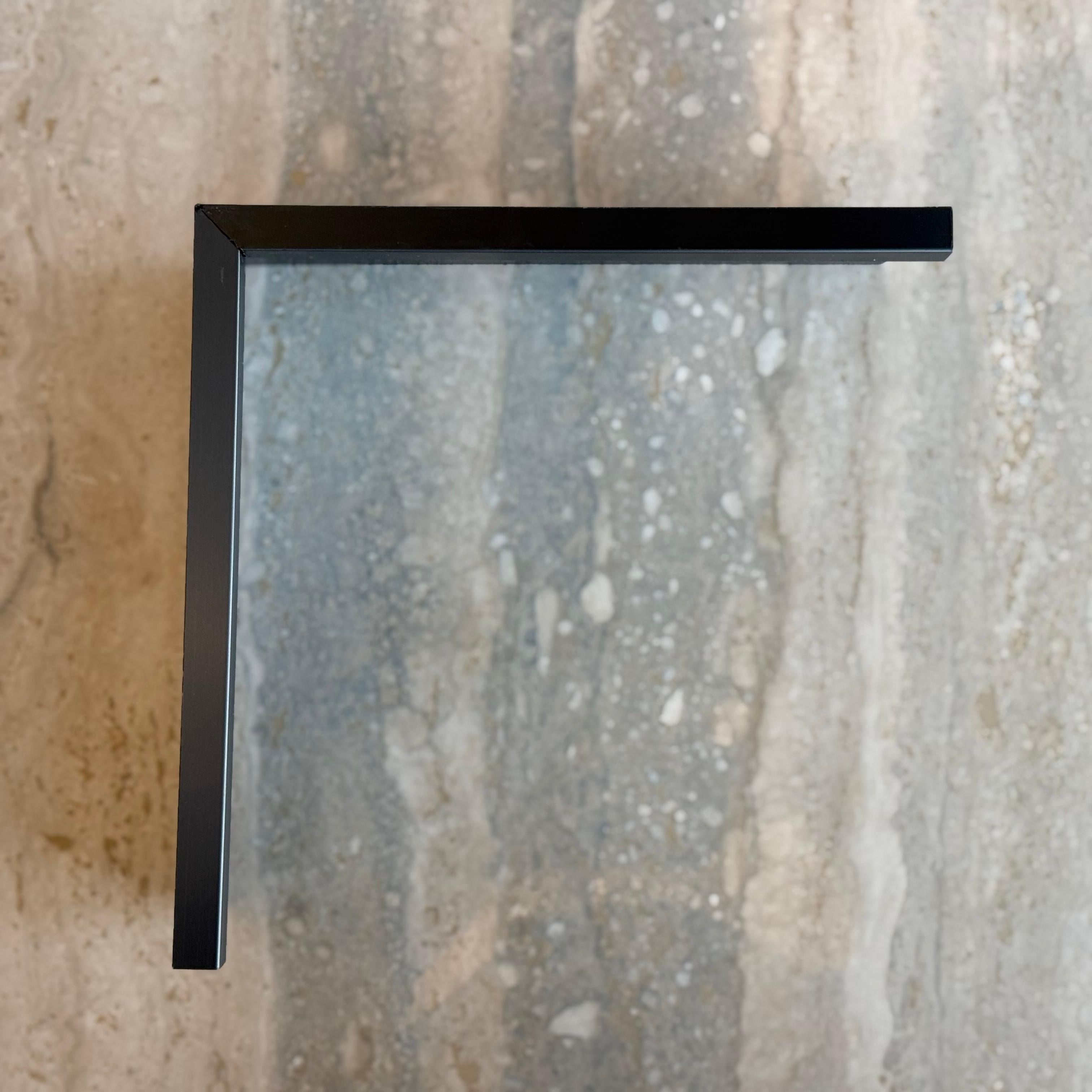 Black R0 10cm internal corner skirting accessory by BEACON for wall panels and profiles, shown in close-up view.
