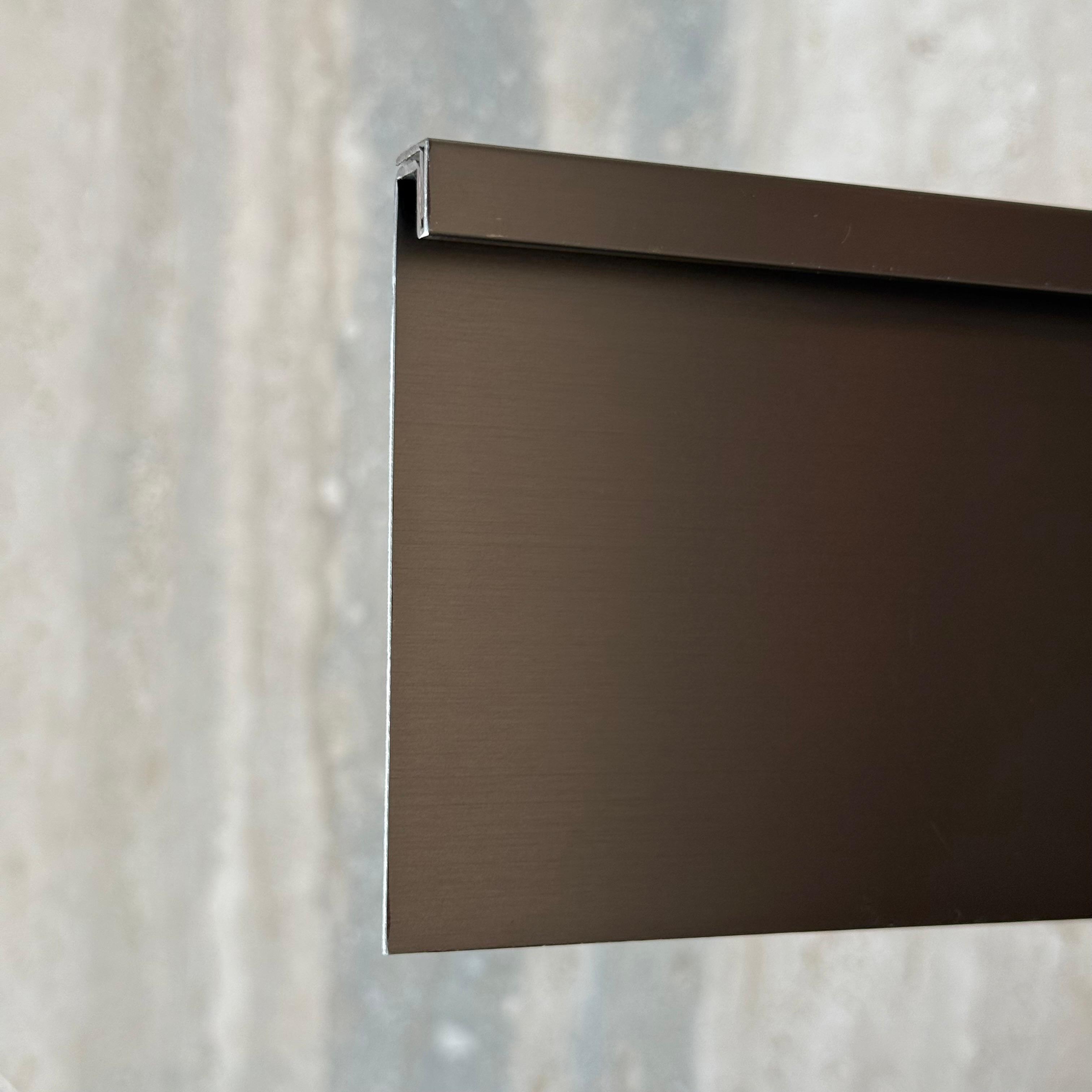 Black R200 10cm external corner skirting accessory from BEACON wall panels and profiles, designed for seamless corner finishing.
