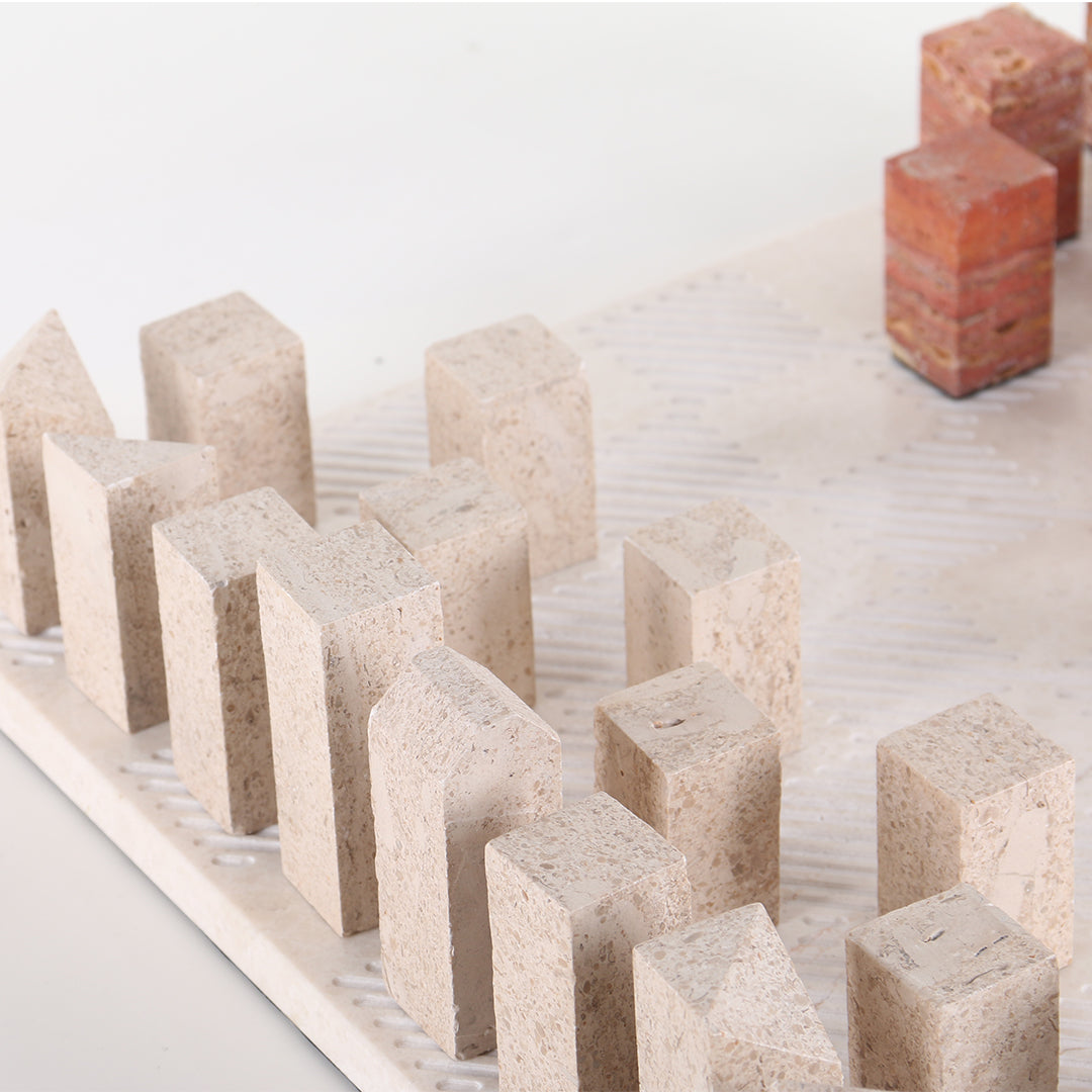 Red Ochre Chessboard figurine from BEACON, a stylish home decor piece, featuring a vibrant red ochre design and intricate details.