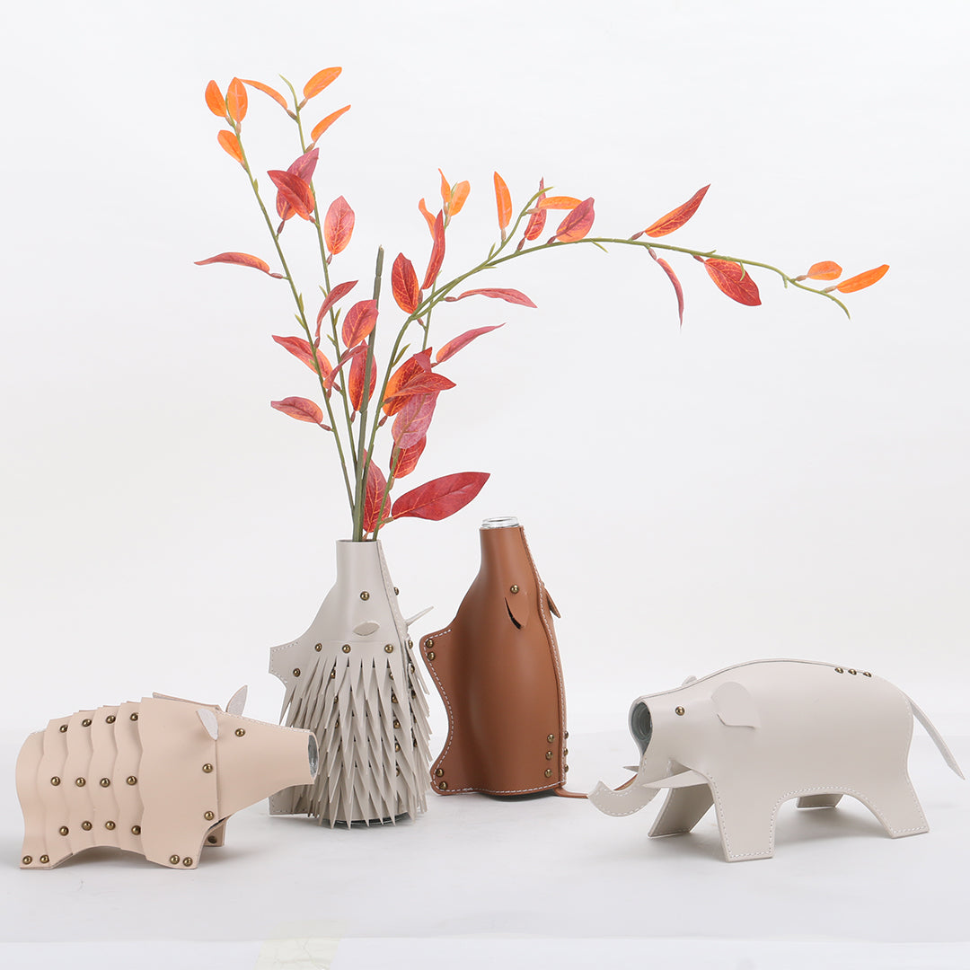 Beige Rhino Vase Sculpture by BEACON, decorative ceramic vase with detailed rhino design, ideal for modern home decor.