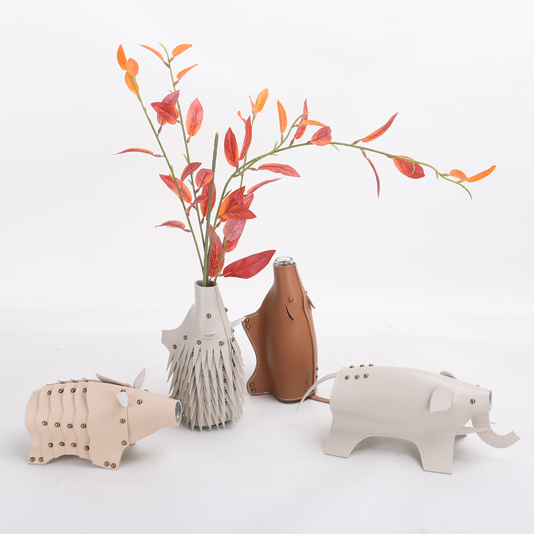 BEACON Rhino Vase or Sculpture KB3023, decorative ceramic vase shaped like a rhinoceros, with detailed sculptural design.