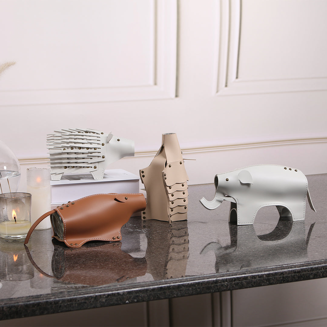 BEACON Rhino Vase/Sculpture KB3023 featuring a detailed rhinoceros design, ideal as a decorative vase or sculpture.