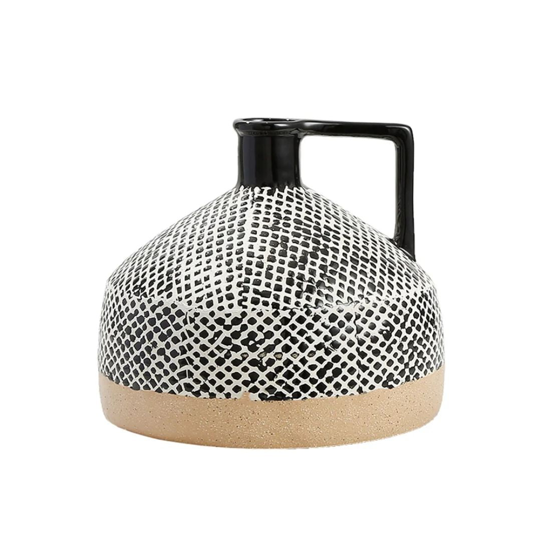 Rhombic BEACON vase in a geometric design, featuring a modern shape and sleek finish, suitable for decorative displays.