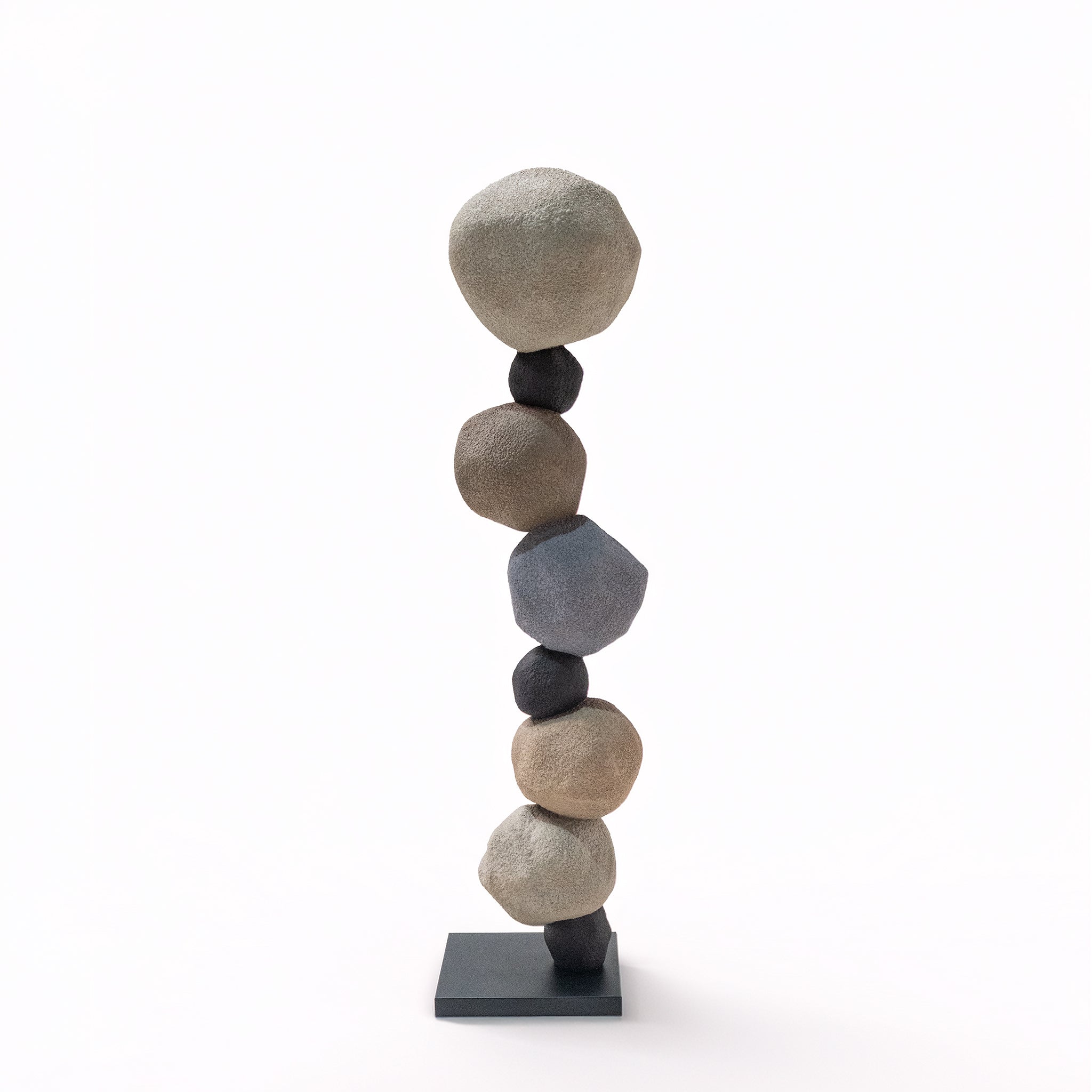 Cairn Fiberglass Sculpture F9177 artwork featuring a stack of rocks with a natural, textured finish by BEACON.
