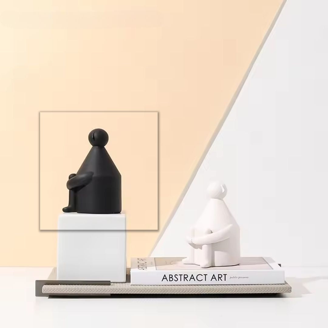 White man round-head figurine from BEACON home decor collection, black and white decorative sculpture for interior display