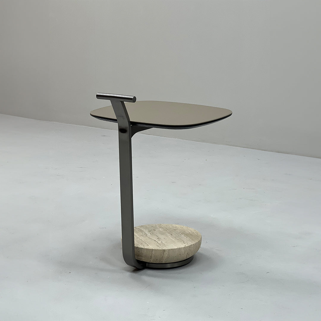 BEACON saddle leather side table with sleek design, featuring a smooth leather surface and sturdy wooden legs.