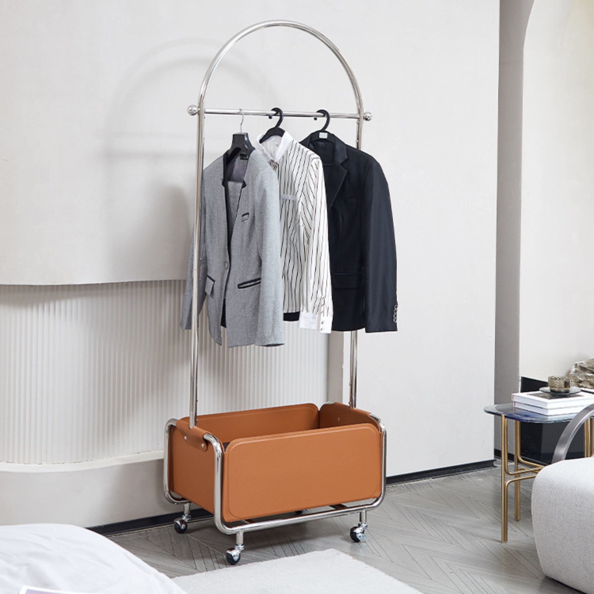 Saddle leather silver hanger by BEACON, designed for clothing organization, featuring durable leather and sleek silver finish.