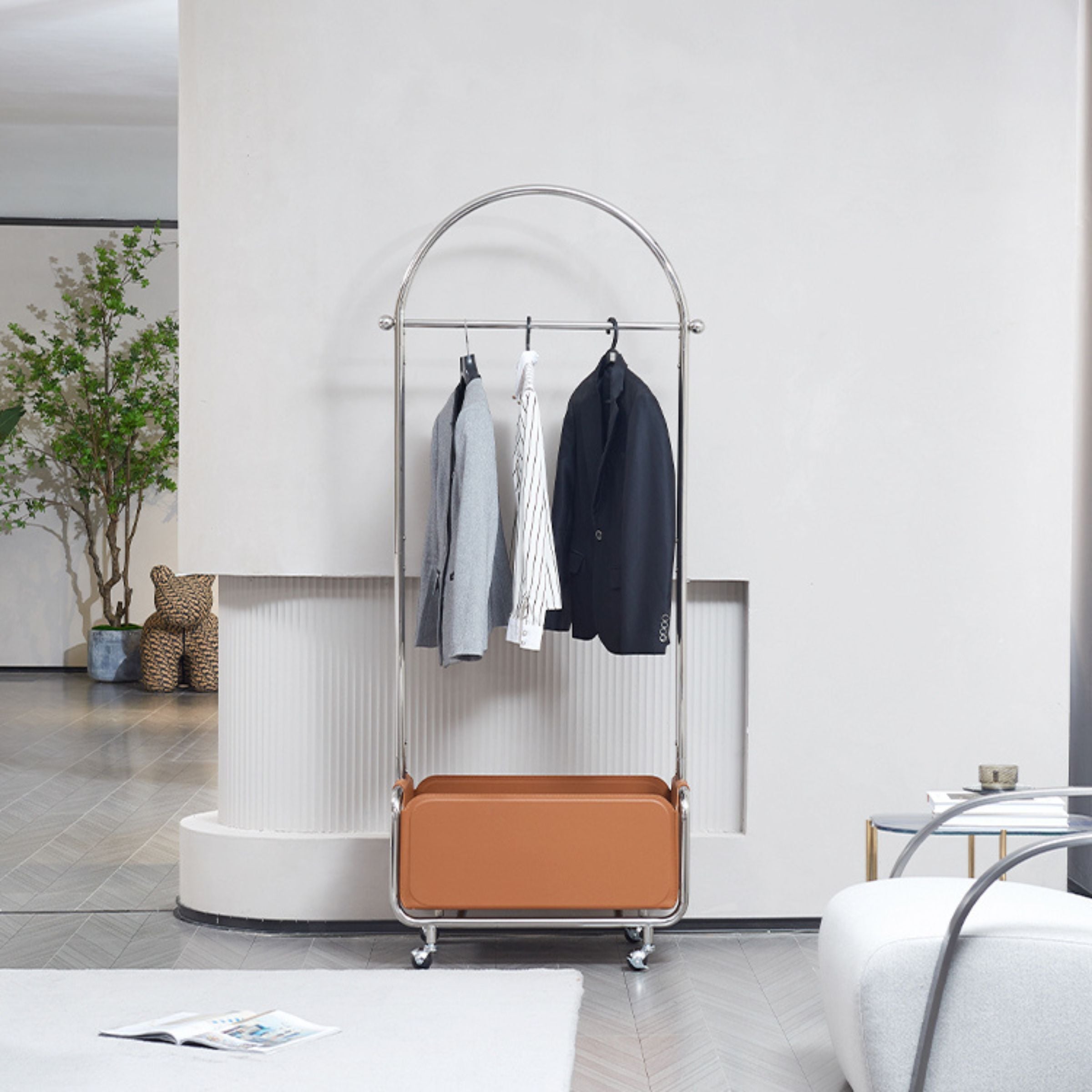 Saddle leather silver hanger by BEACON, designed for clothing organization, with a sleek metal hook and durable leather strap.