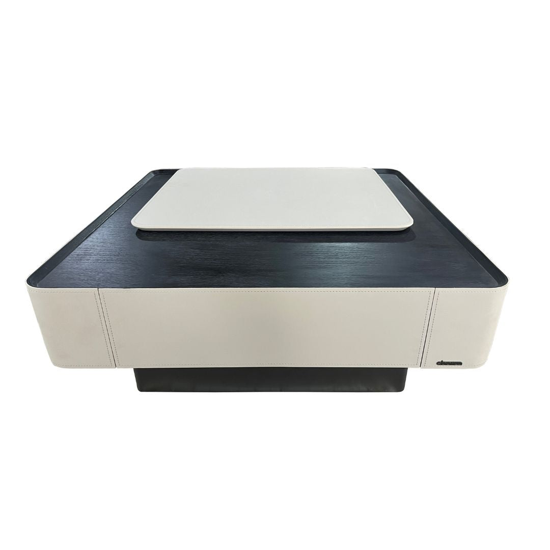 Saddle leather veneer coffee table by BEACON, modern design with sleek surface and sturdy wooden legs.