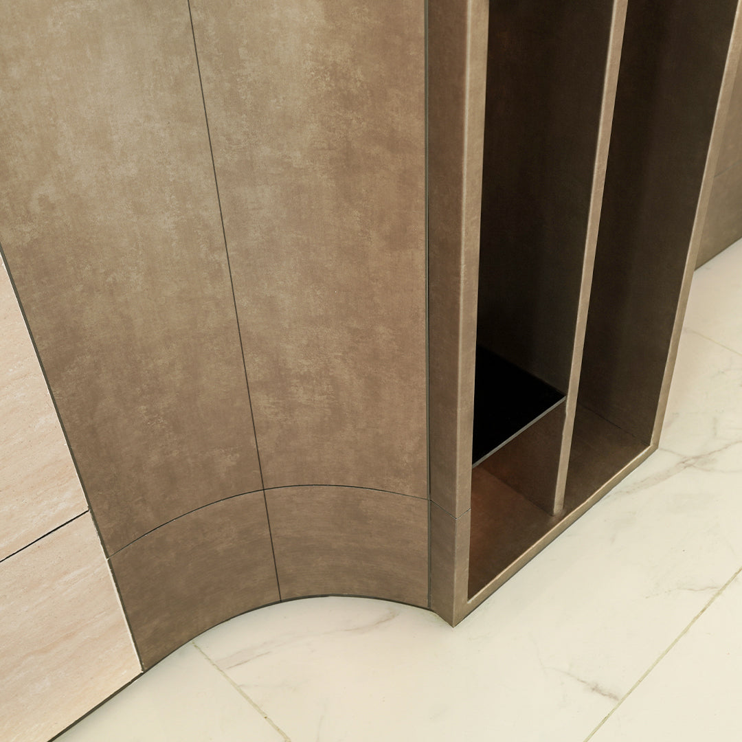 Sample of BEACON 350x24cm WPC slat wall panel in coffee brown with 4-sided wrap for multipurpose interior decoration.